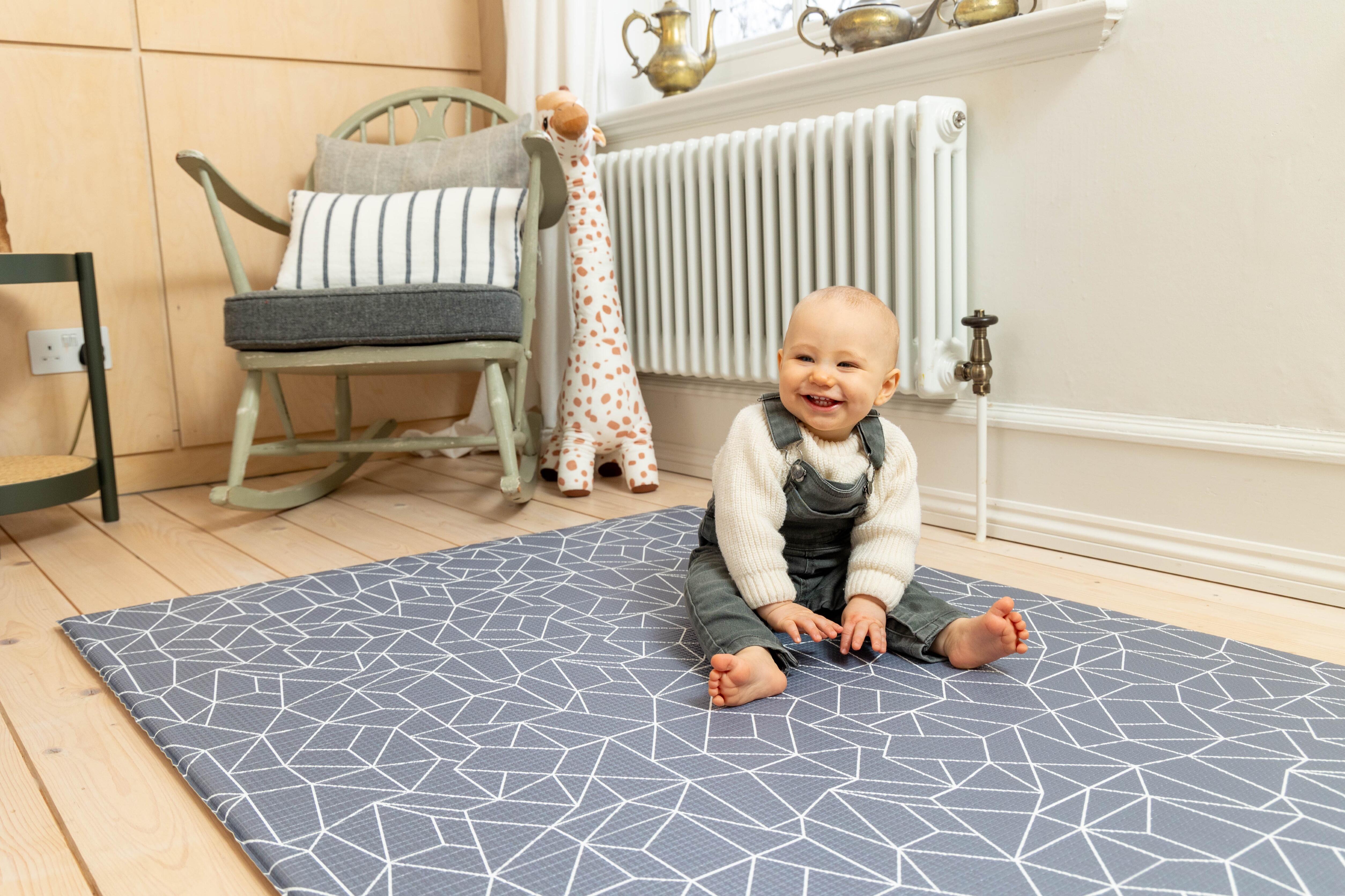 Medium Nordic Explorer Playmat in Storm Grey styled in a modern neutral home