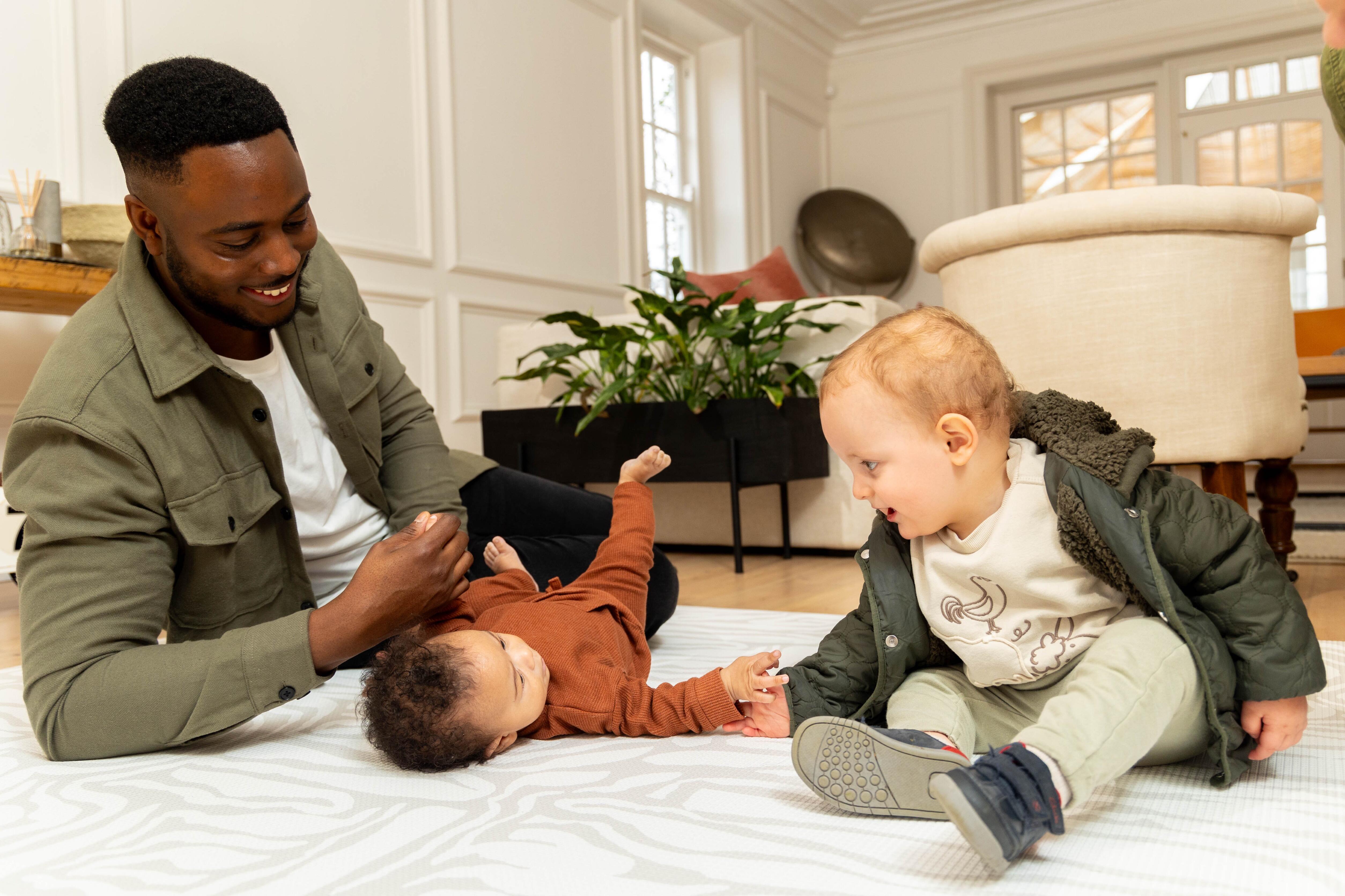 Grey Pathway Playmat – extra-thick, wipeable playmat providing comfort and protection for babies and toddlers.