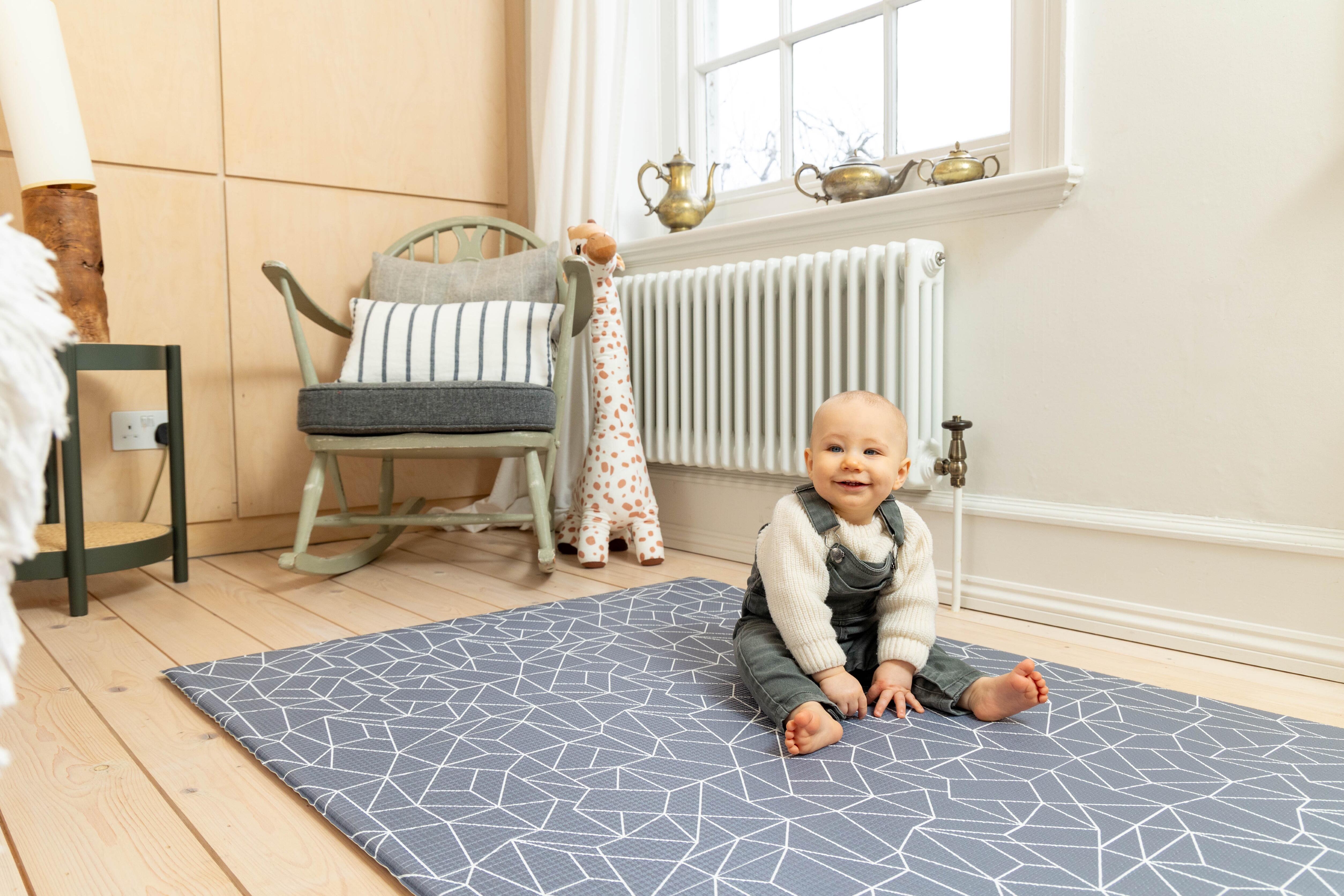 Nordic Explorer Storm Grey Playmat – luxury padded baby playmat designed to blend seamlessly with home interiors.
