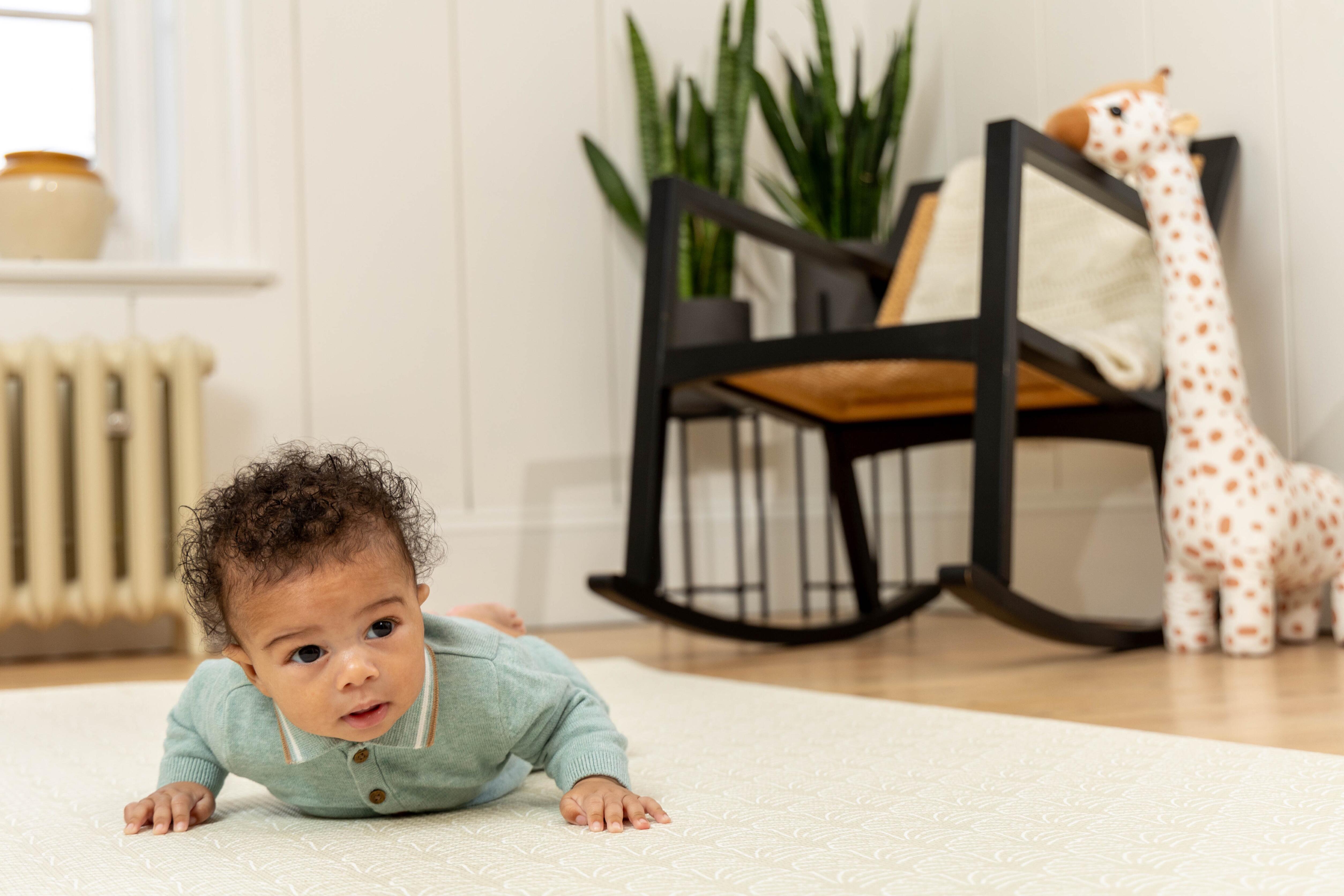Large Baby Playmat – Neptune design in Sage, reversible and designed to complement stylish neutral homes.