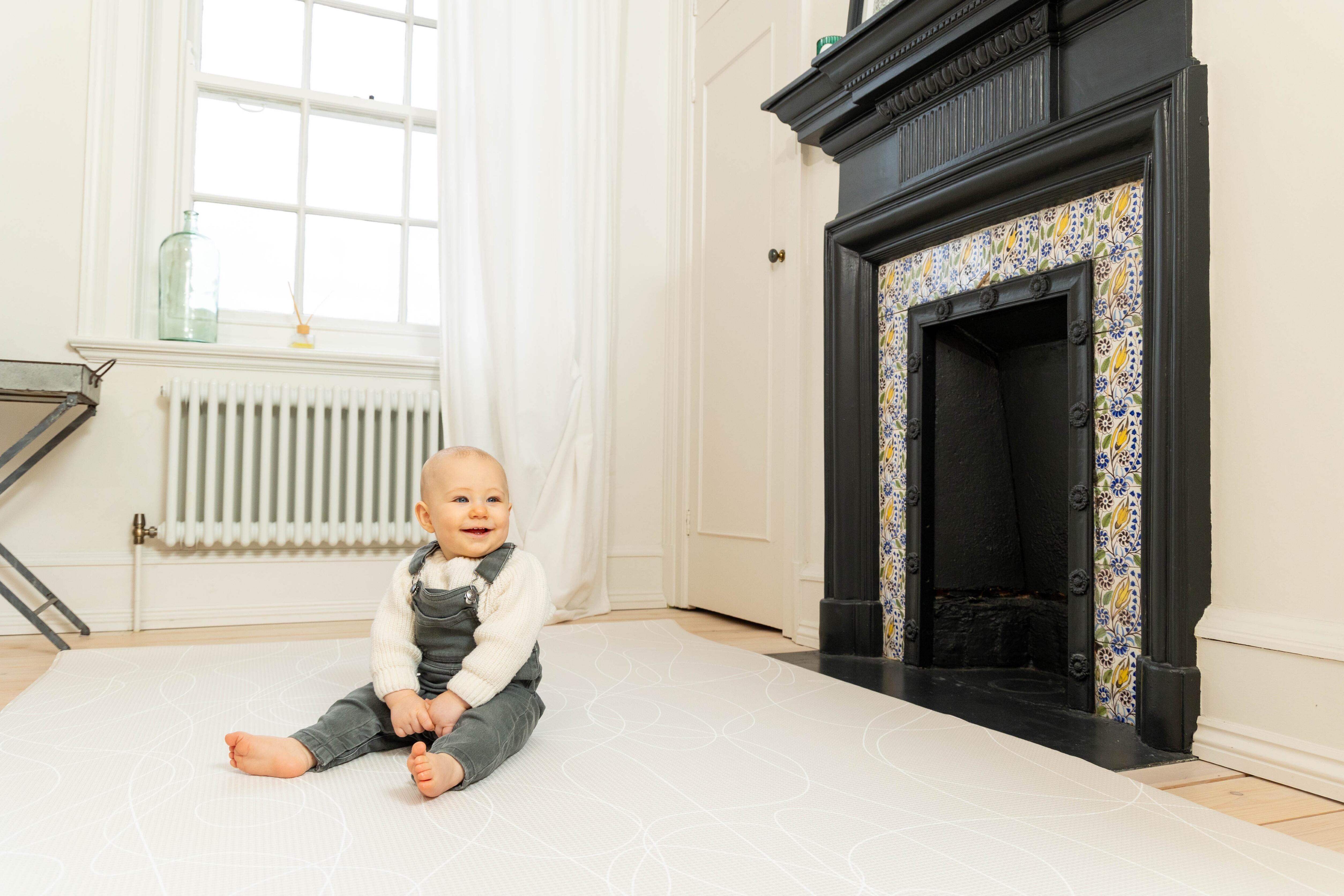 Reversible Tiny Trekker foam playmat with 1.5 cm cushioning