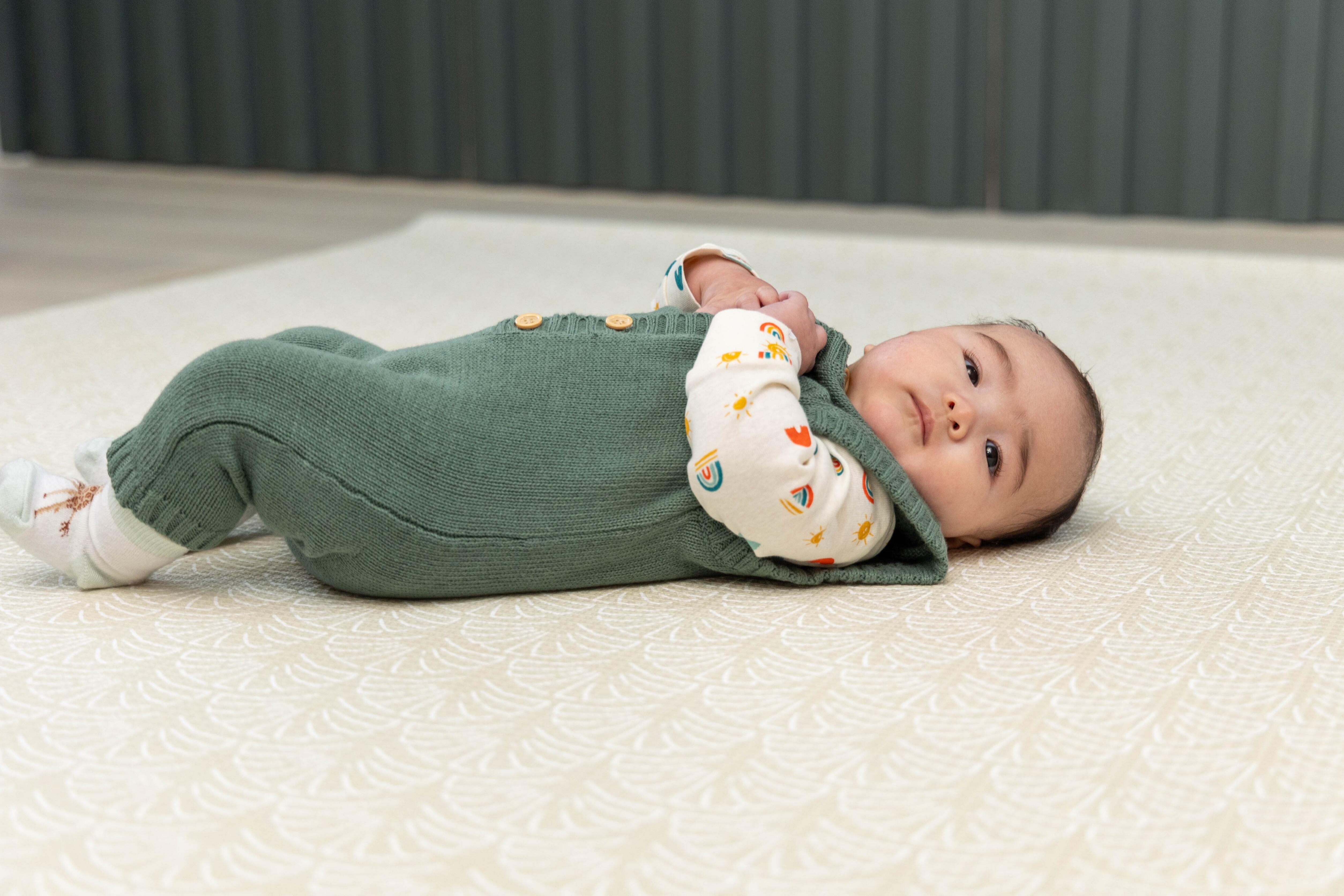 Close-up of the Medium Neptune Playmat in Sage detailing and texture