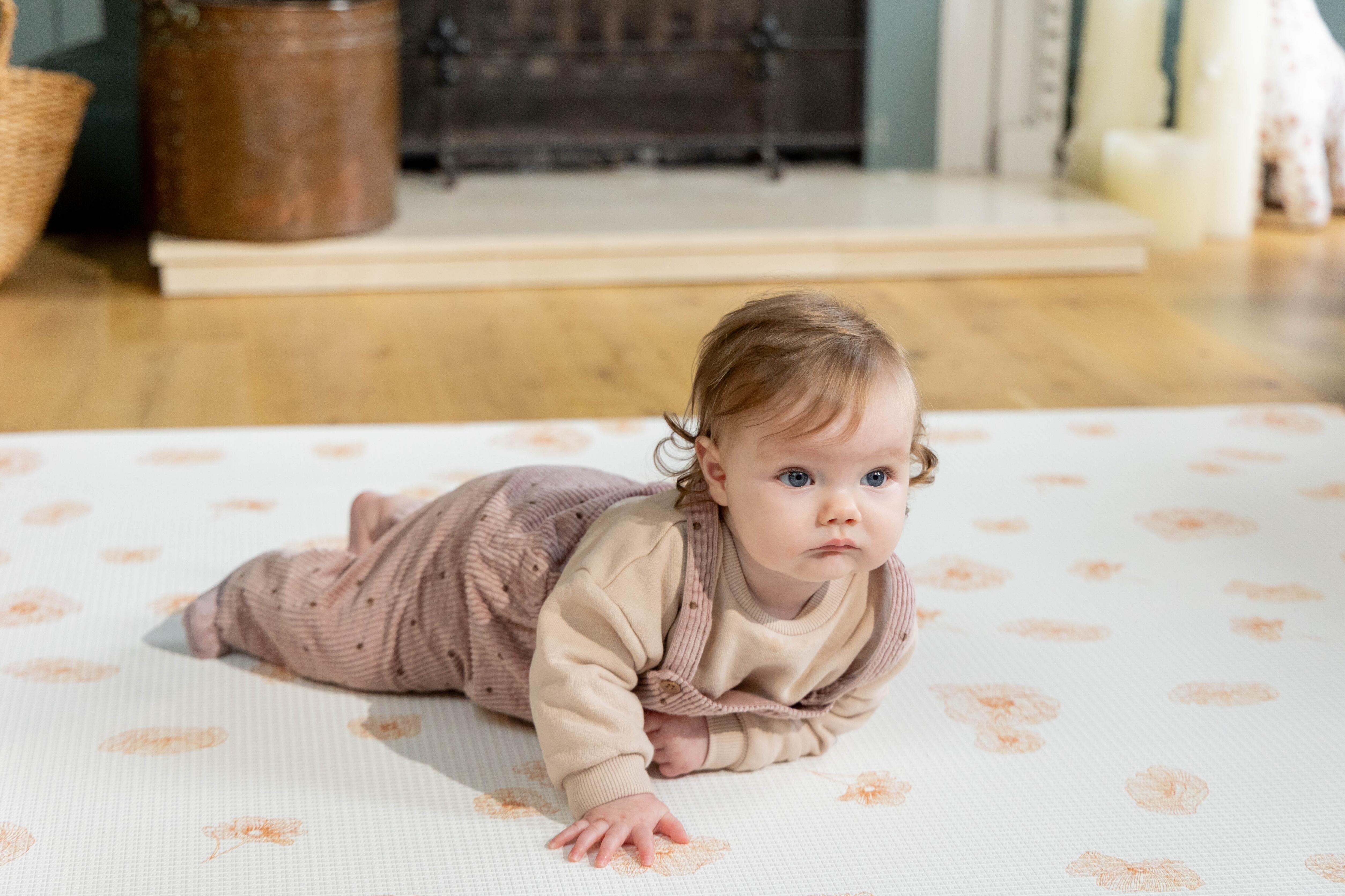 Large Flora Playmat – non-toxic, wipeable, and extra-thick for safe tummy time and everyday play.