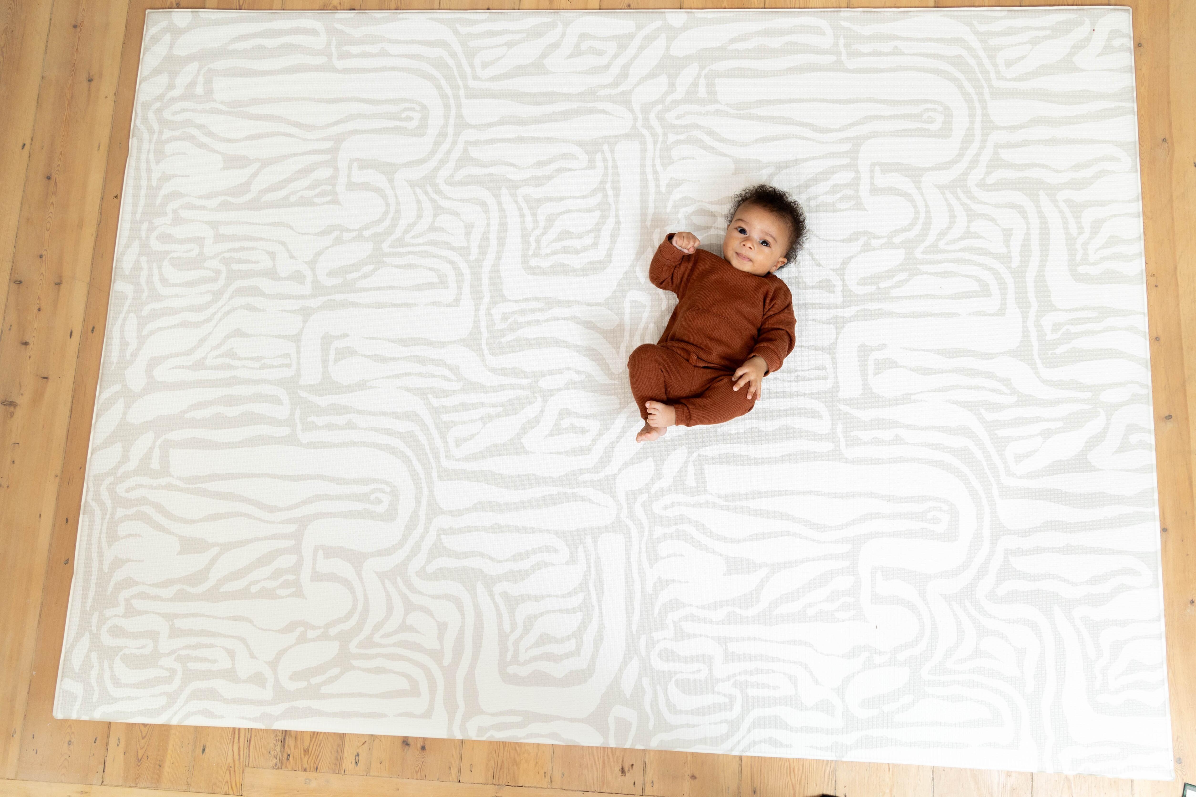 Neutral Grey Pathway Playmat shown in natural home lighting