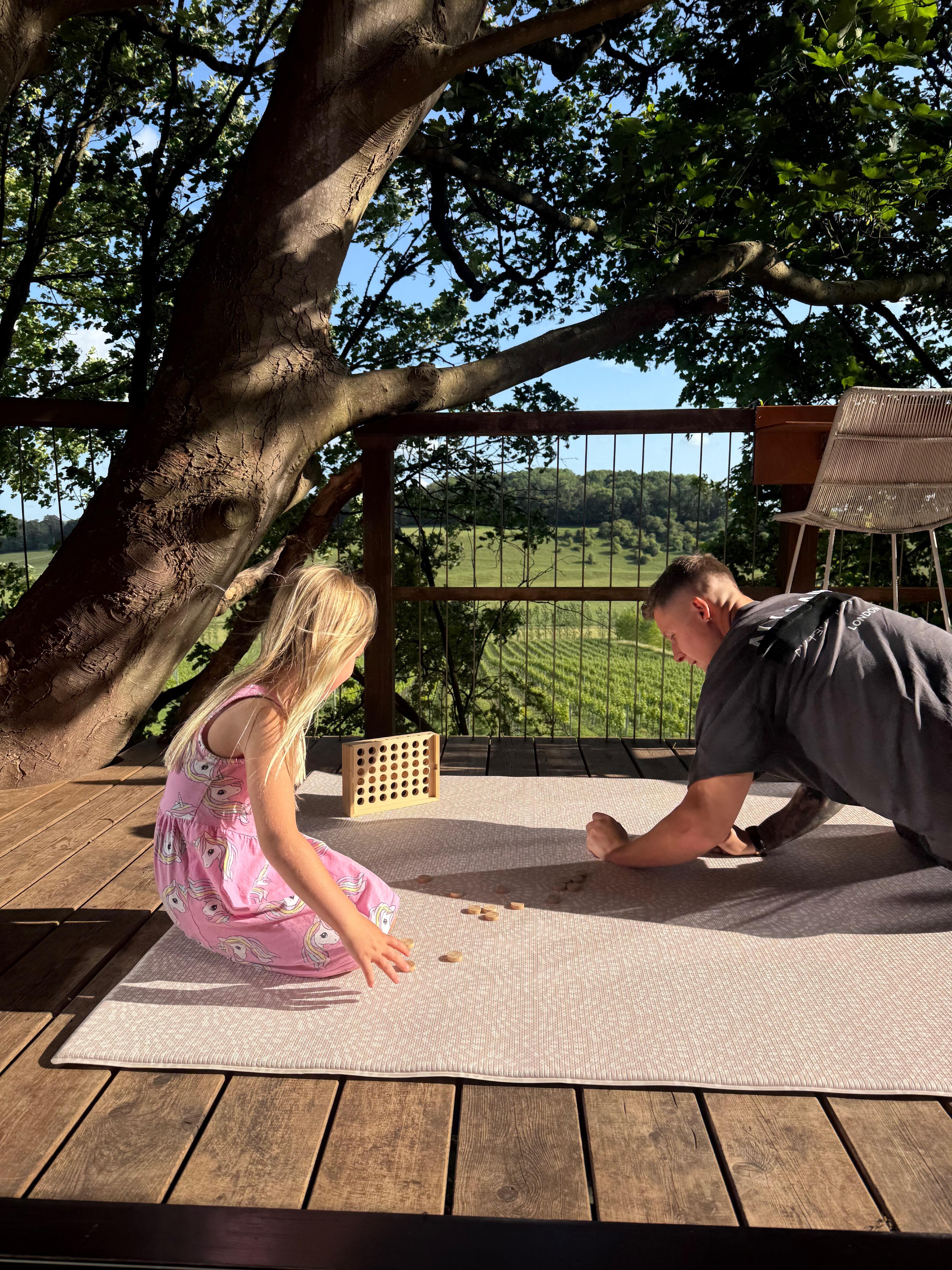 Scandi Pink reversible playmat laid flat – soft pastel tone complementing modern interiors by Little Fae