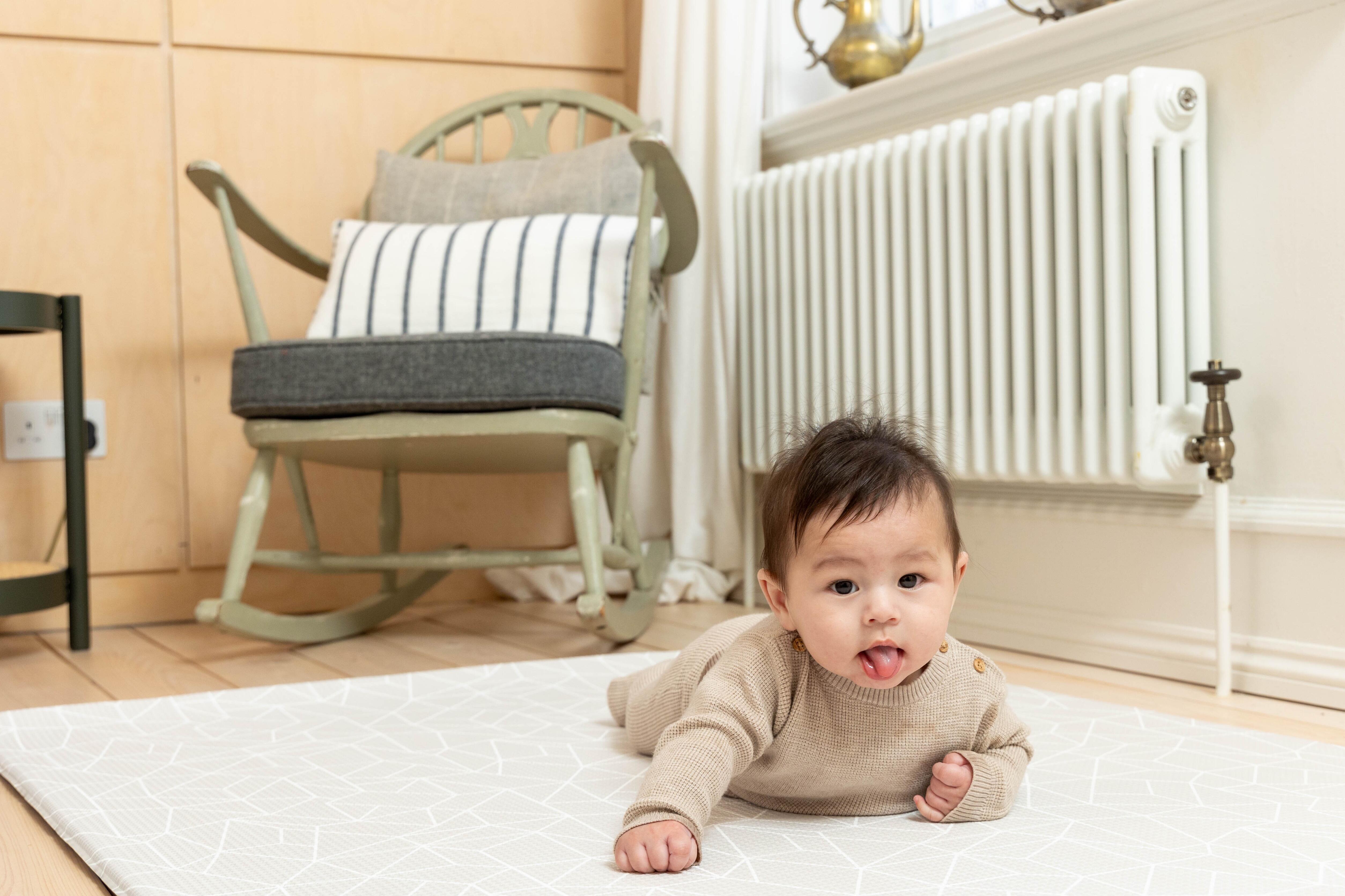 Reversible Greige pattern of the Medium Nordic Explorer Playmat with cushioned padding