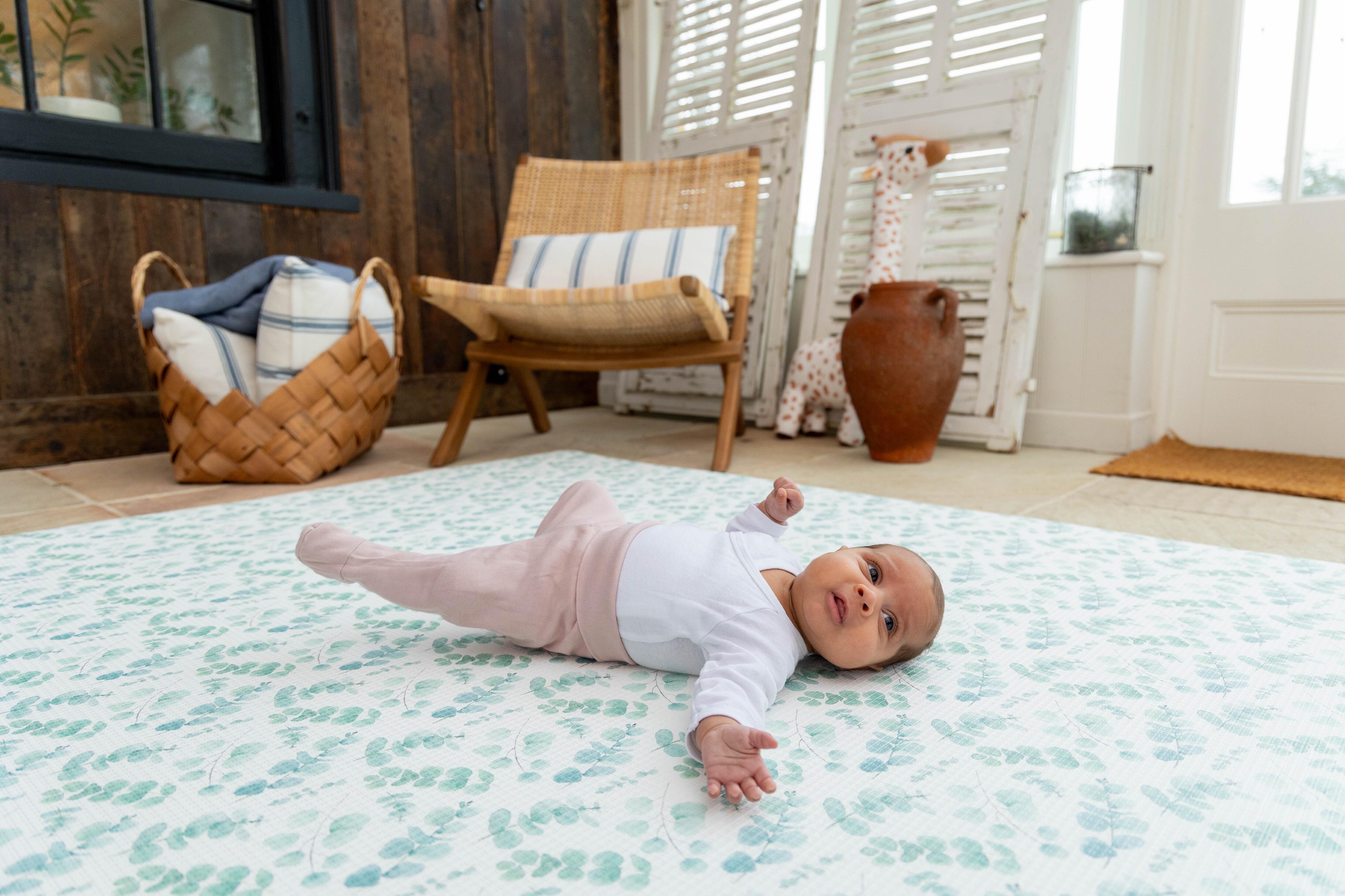 Fresh Eucalyptus Playmat in Botanical Green shown in natural soft lighting