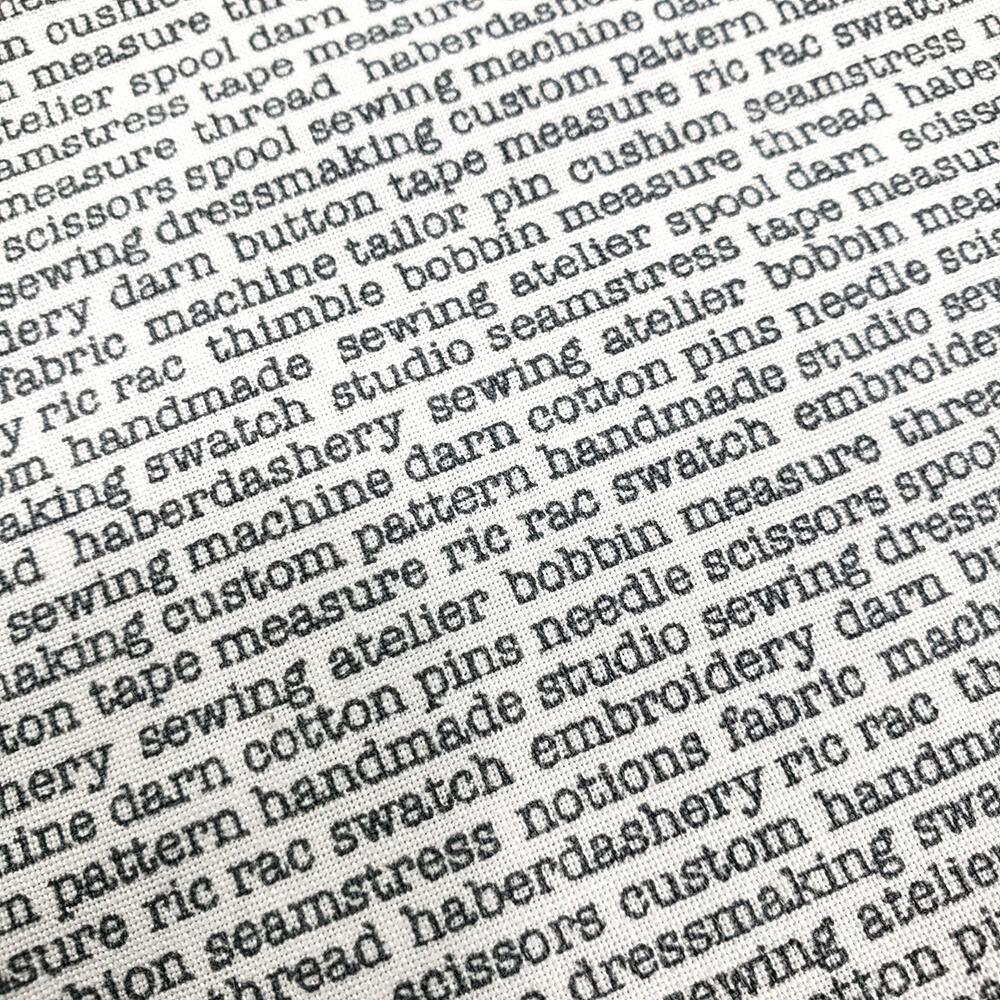 Makower atelier, tape measures fabric, typed sewing words, fashion themed fabric, tailor's fabric