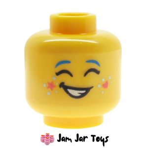 LEGO® Izzie Head, Dark Azure Eyebrows, Bright Pink Stars on Cheeks, Dots, Open Mouth Smile / Closed Eyes. HF67