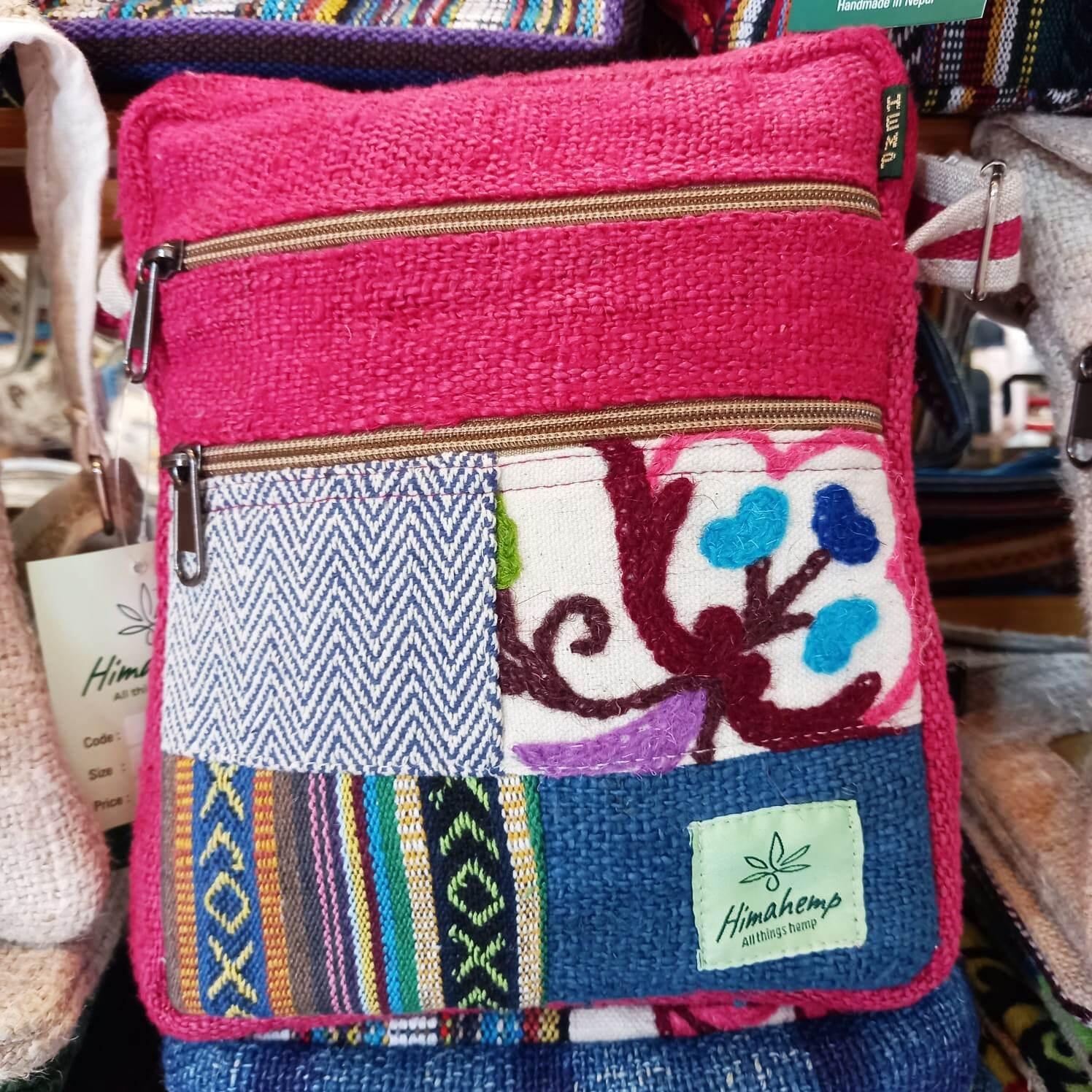 Multi Pocket Crossbody bag in Pink with multiple designs