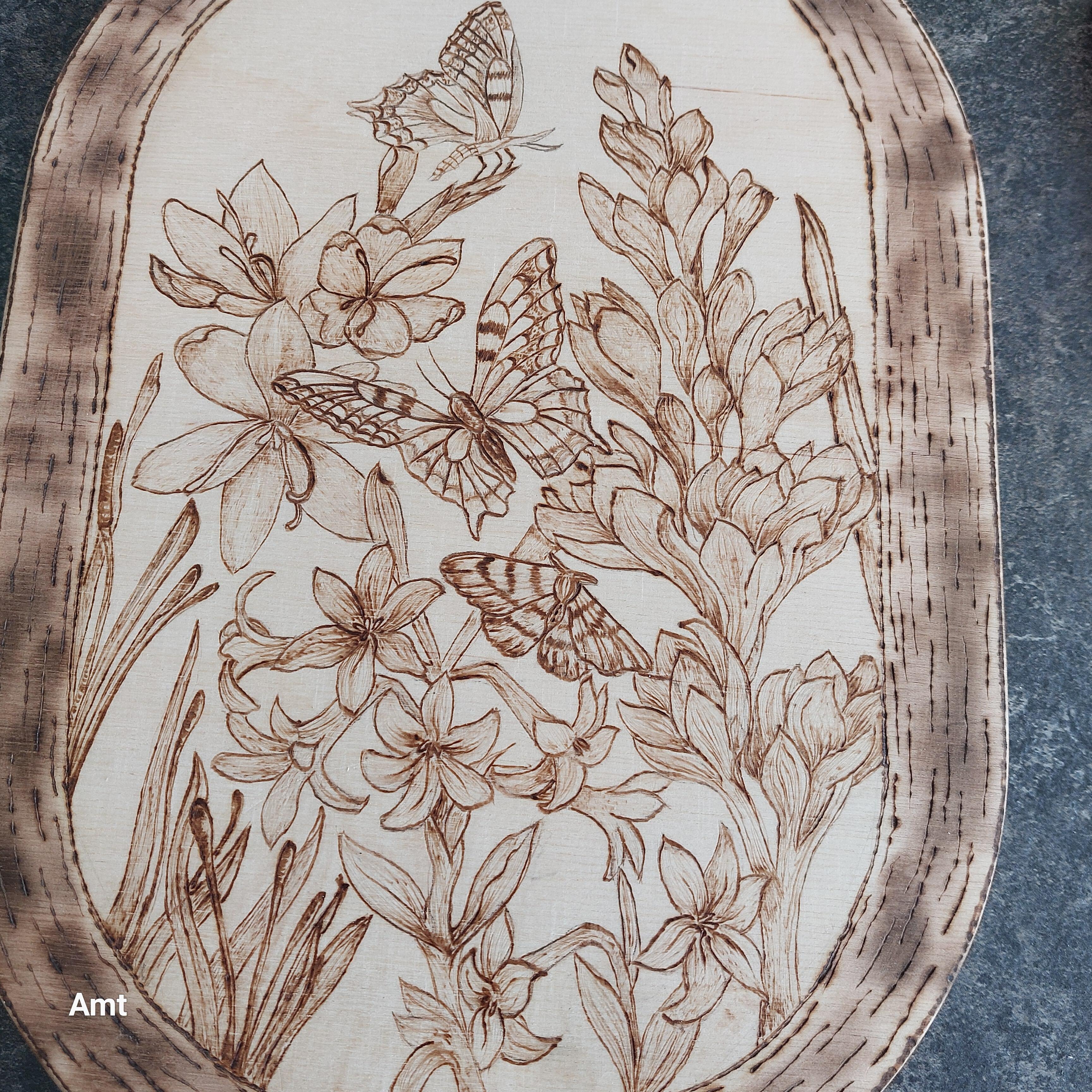 Wooden pyrography picture of butterflies and flowers
