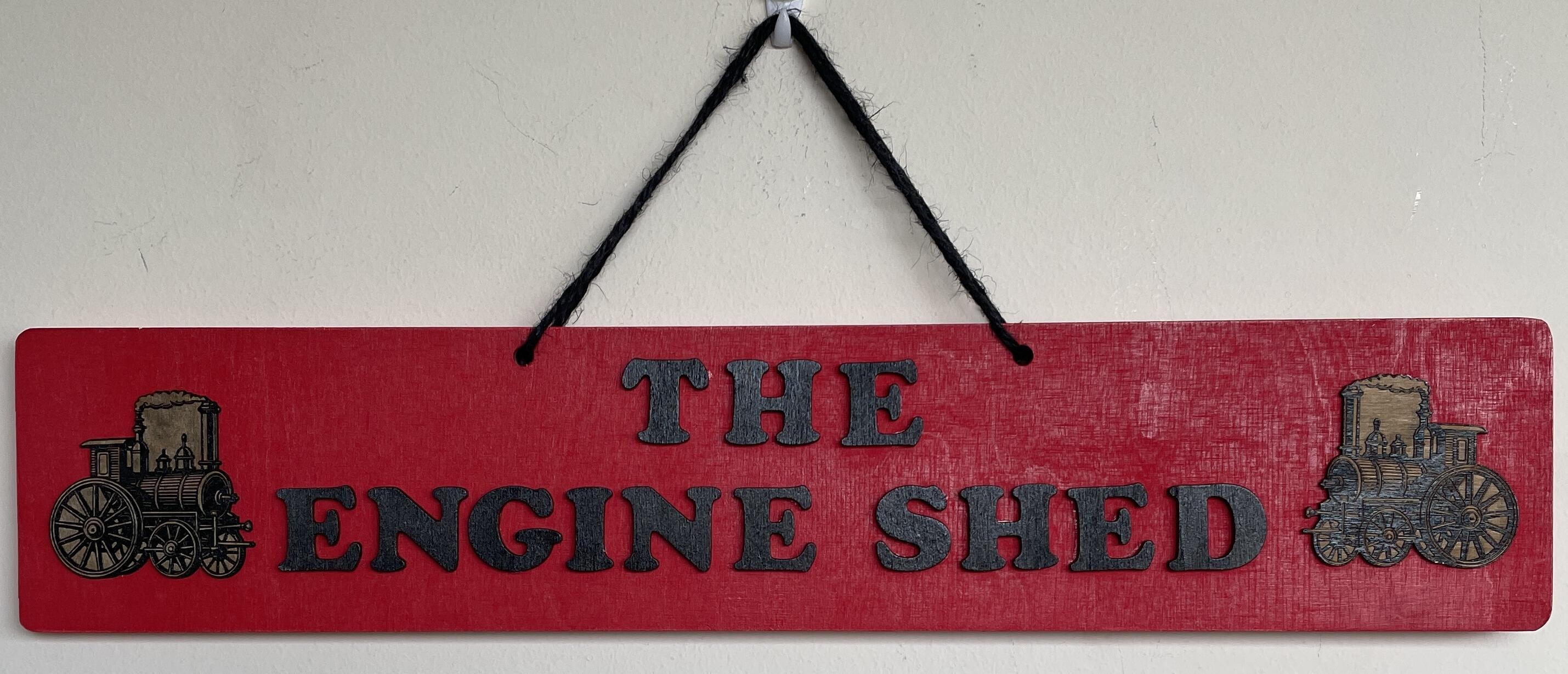 Steam train themed wooden shed sign with painted lettering