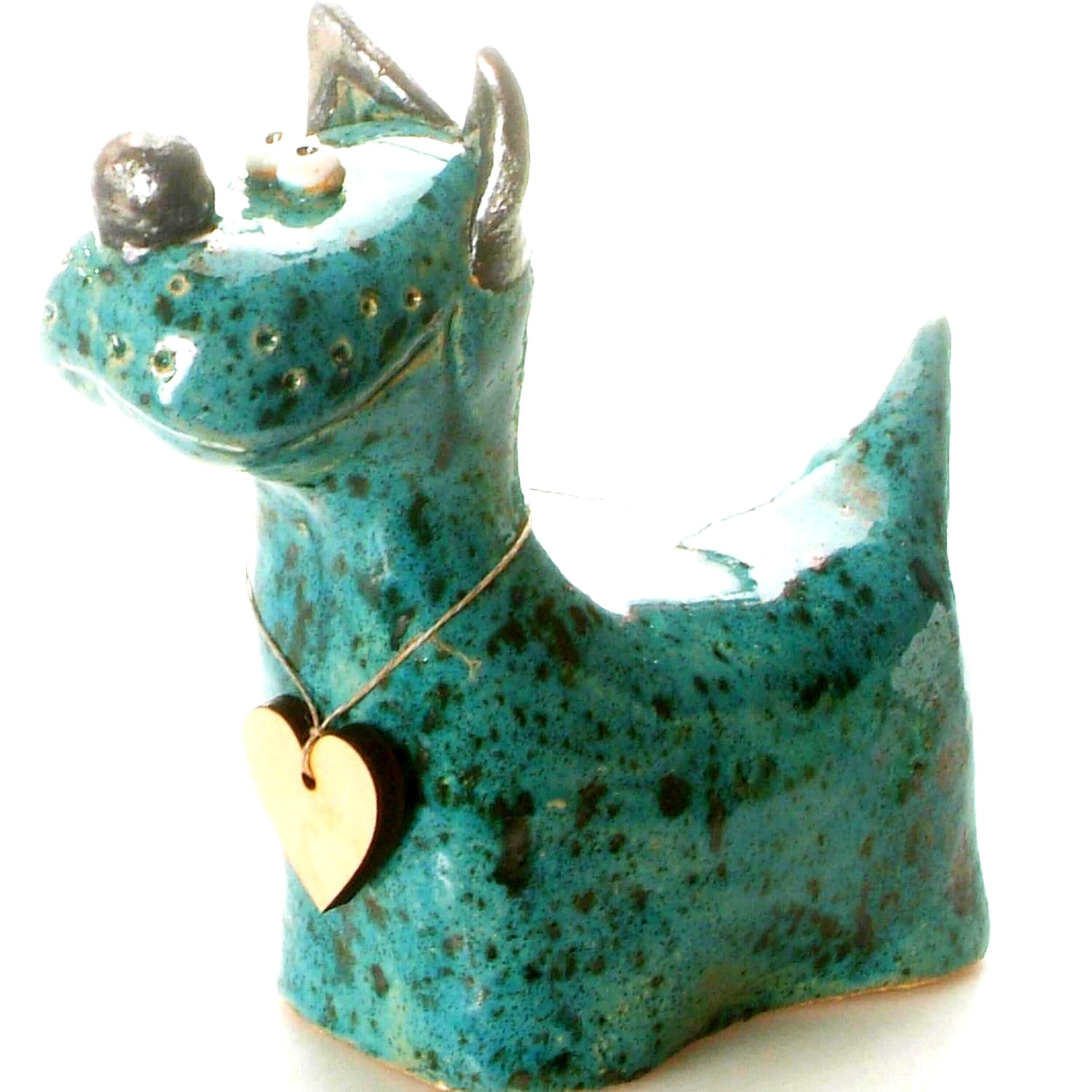 Handmade Ceramic Terrier Quirky Dog in various colours, crafted by skilled artisans, featuring a playful and whimsical design, perfect for home decor.