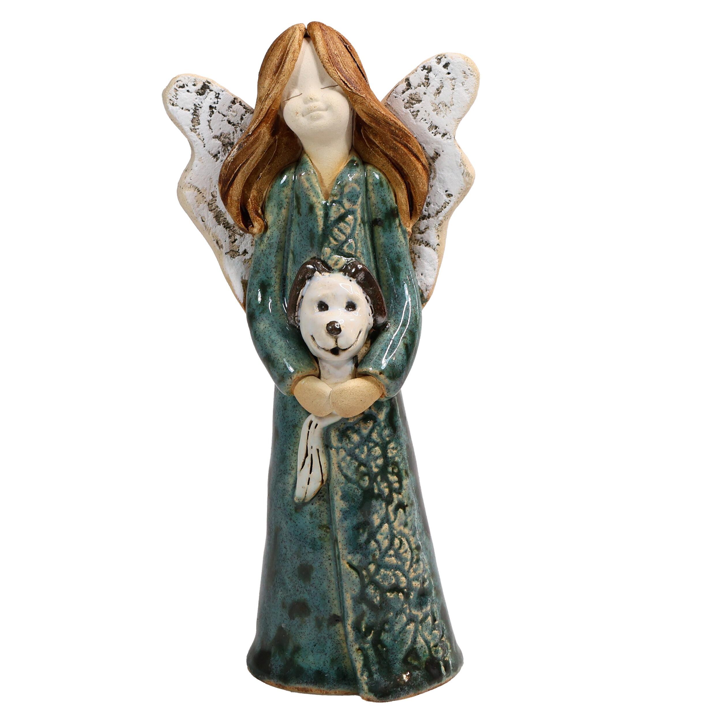Handmade ceramic angel in a teal dress with a white dog, gift-packed. Unique ornament celebrating “The dog makes a house a home.”