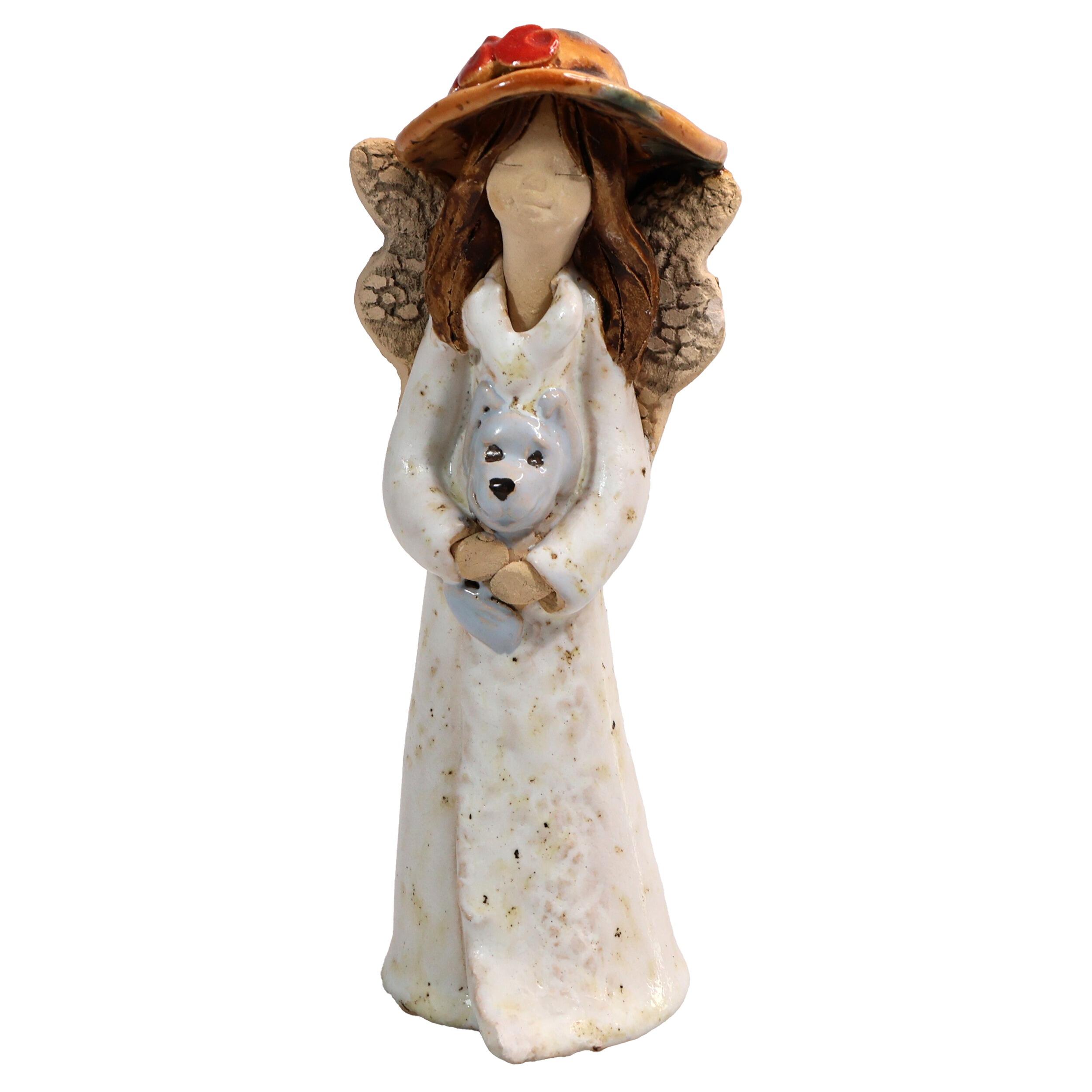 Handmade ceramic angel in white dress holding a grey dog, gift-packed. Unique ornament celebrating “The dog makes a house a home.”
