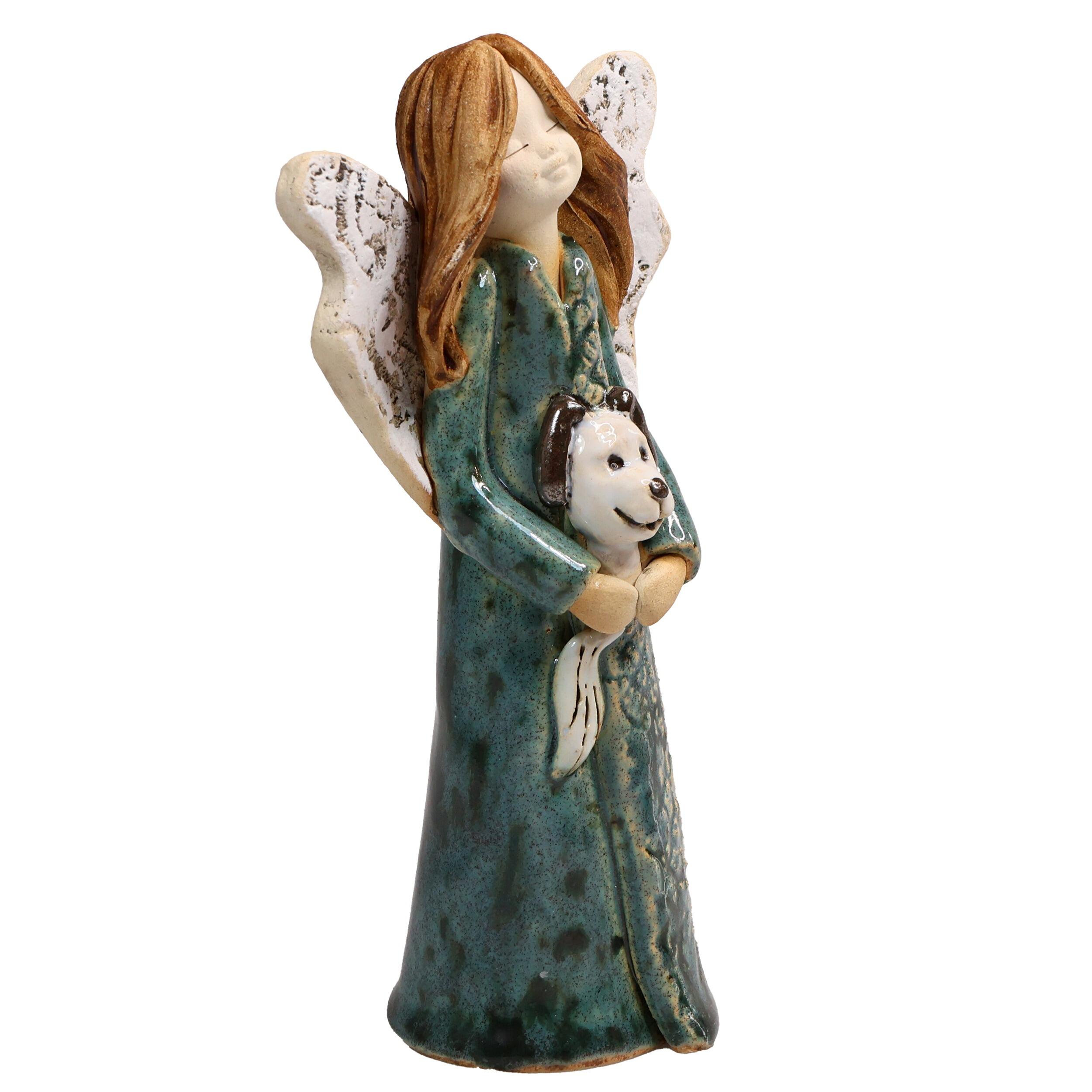 Handmade ceramic angel in a teal dress with a white dog, gift-packed. Unique ornament celebrating “The dog makes a house a home.”