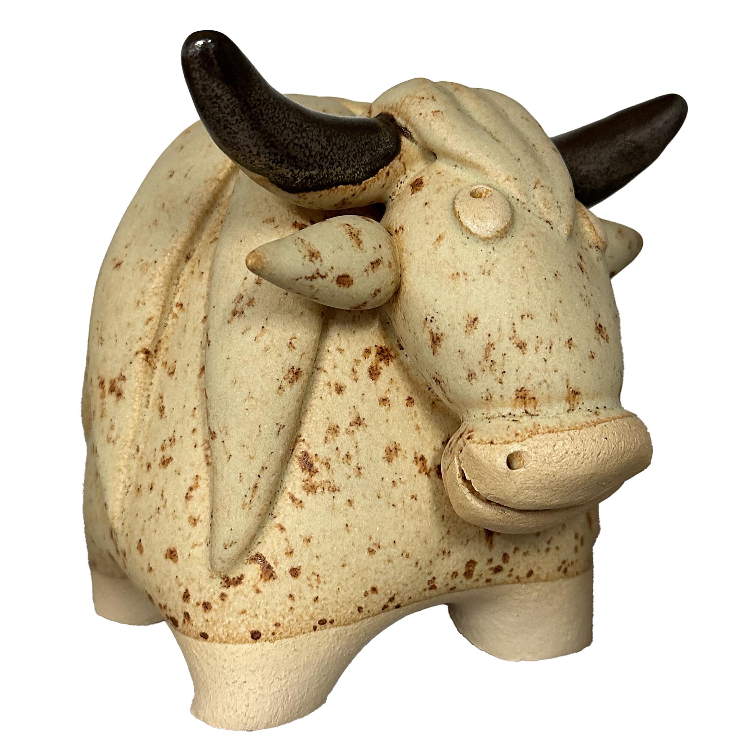 Handmade ceramic Highland cow statue with a bold, masculine highlander character.