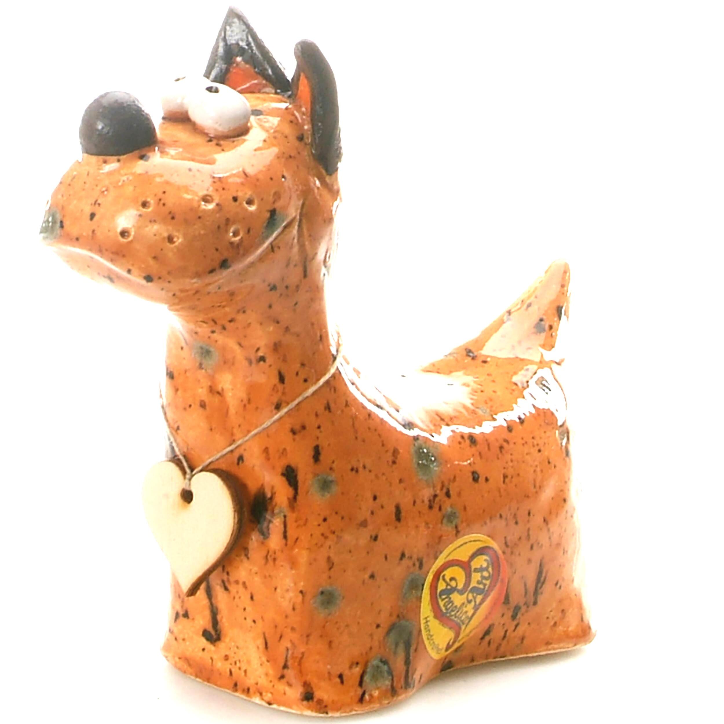 Handmade Ceramic Terrier Quirky Dog in various colours, crafted by skilled artisans, featuring a playful and whimsical design, perfect for home decor.
