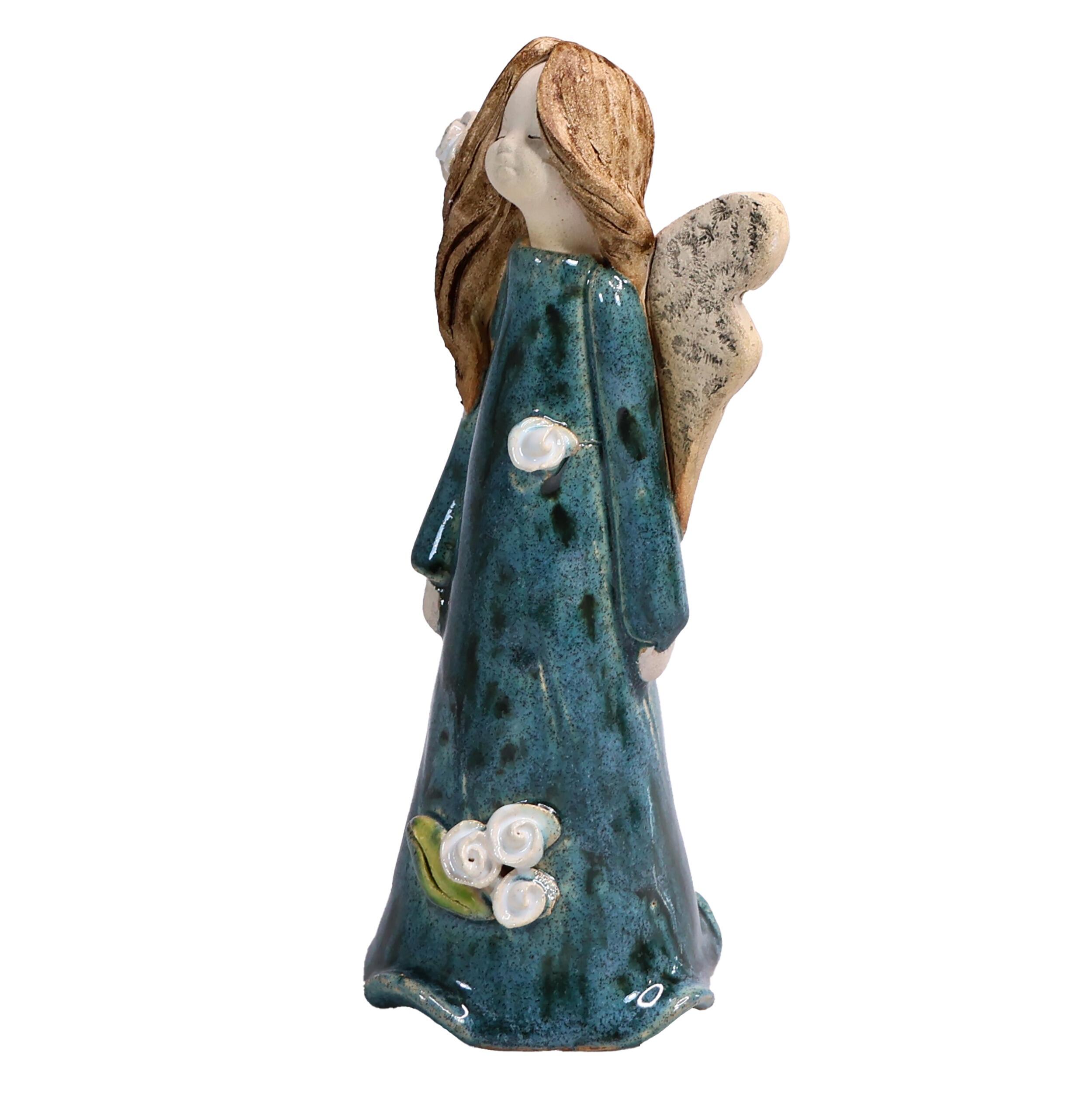 A charming handmade ceramic angel adorned with roses, complete with a heartfelt message card: “I love you from the bottom of my heart to the tips of my toes.”