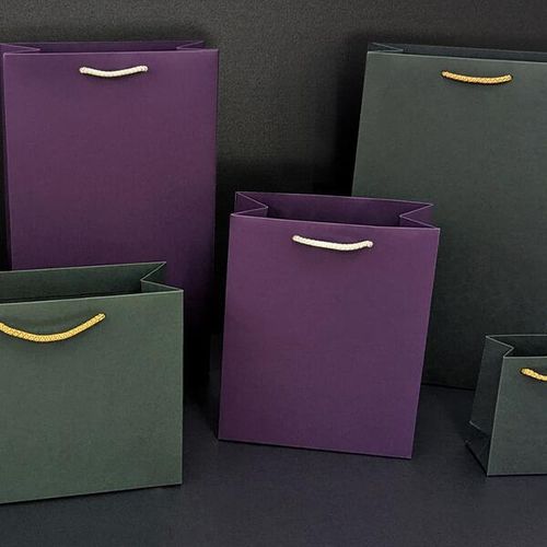 A selection of luxury matt gift bags in a variety of colours and sizes