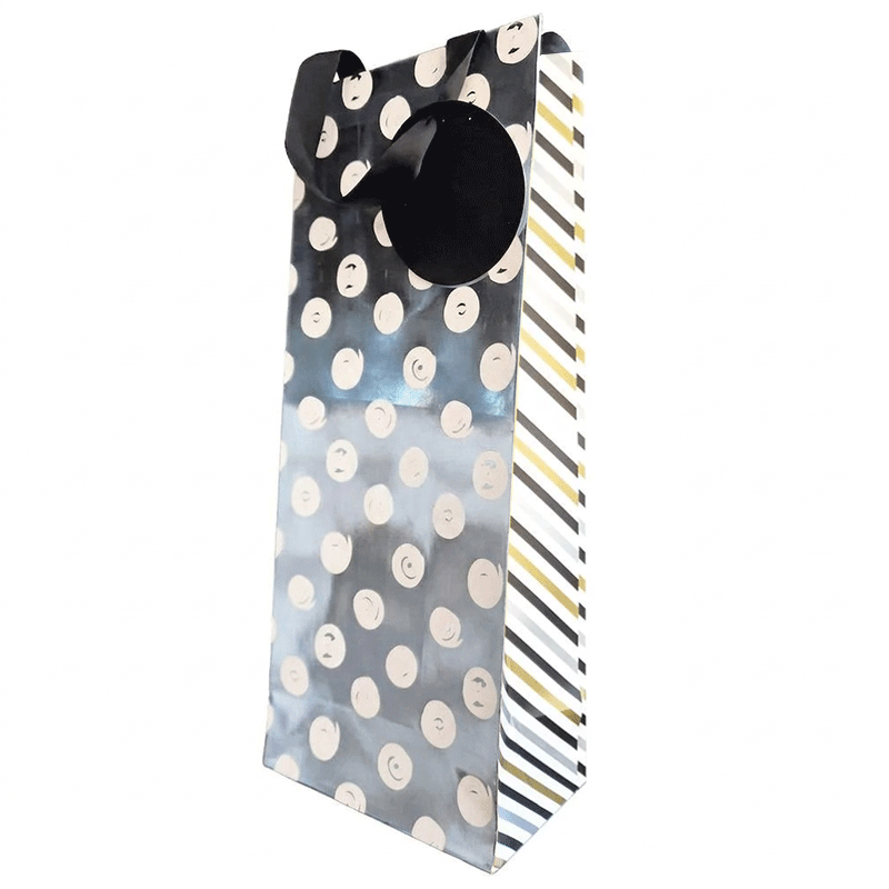 Silver metallic bottle gift bag on a plain white background