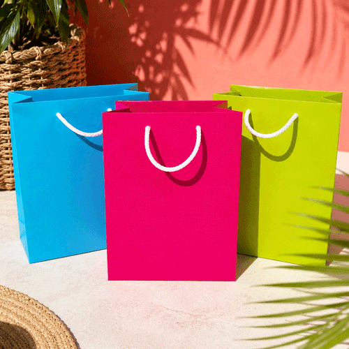 Summer gift bags on a bright summer background