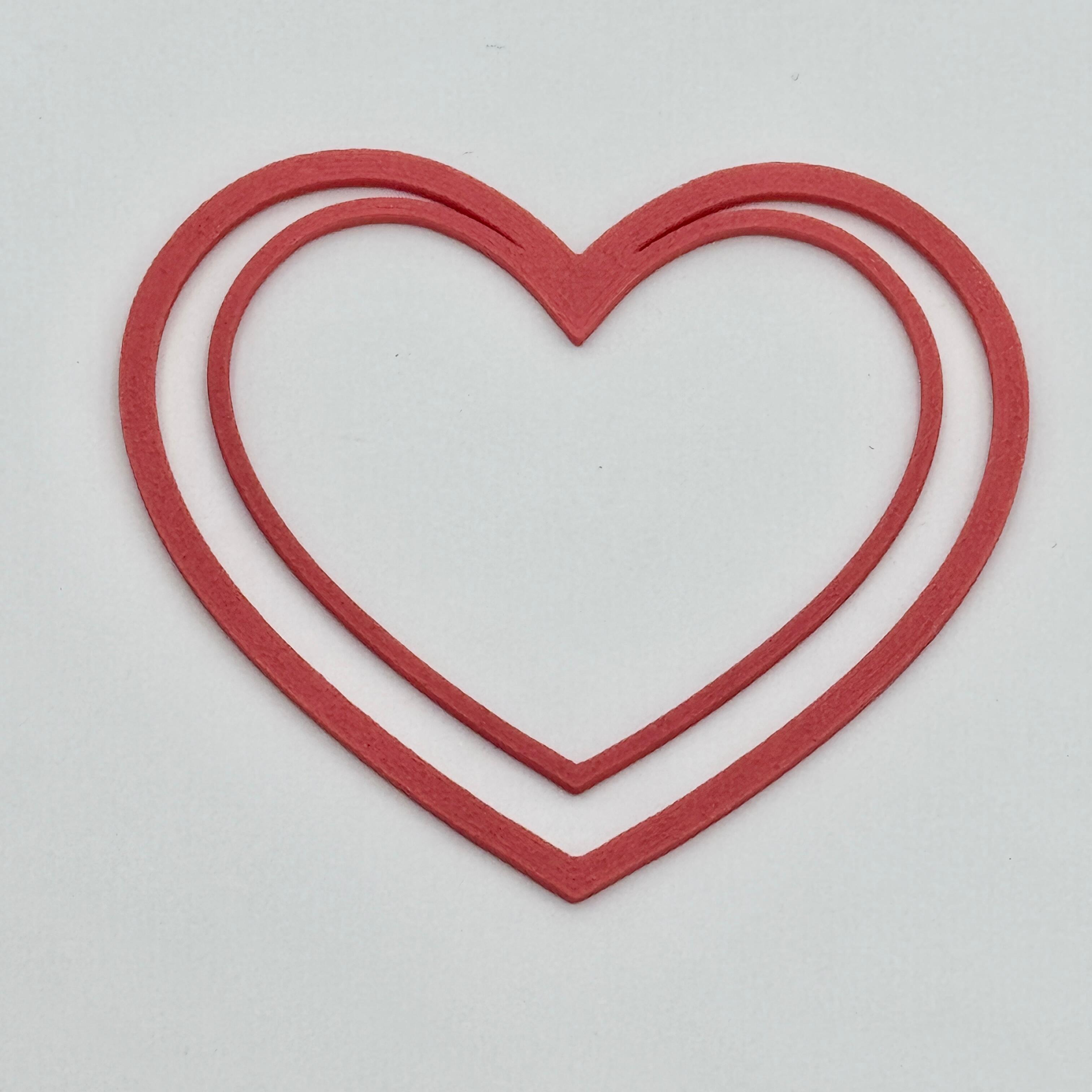red heart shaped bookmark