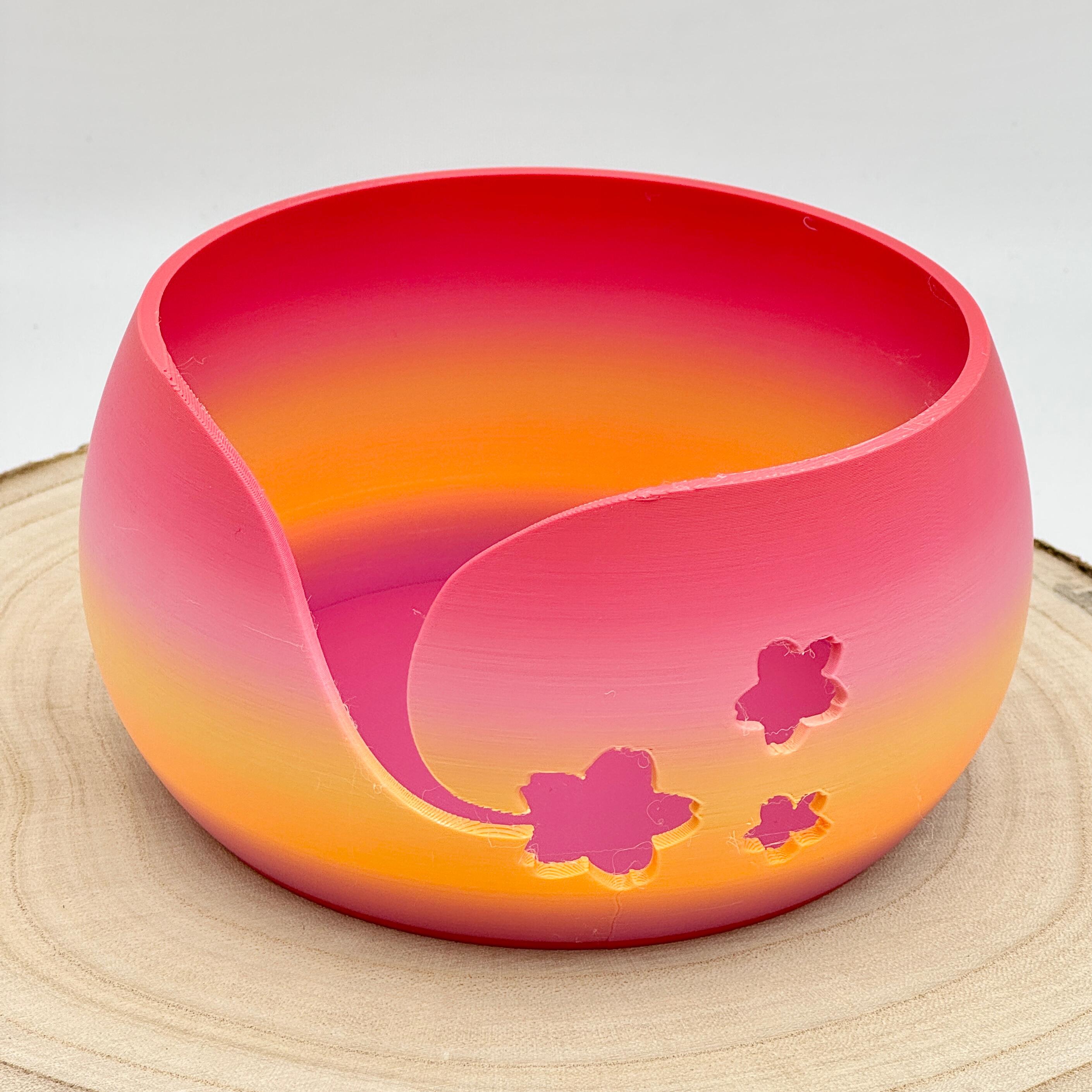 an image of a floral themed yarn bowl in pink & orange