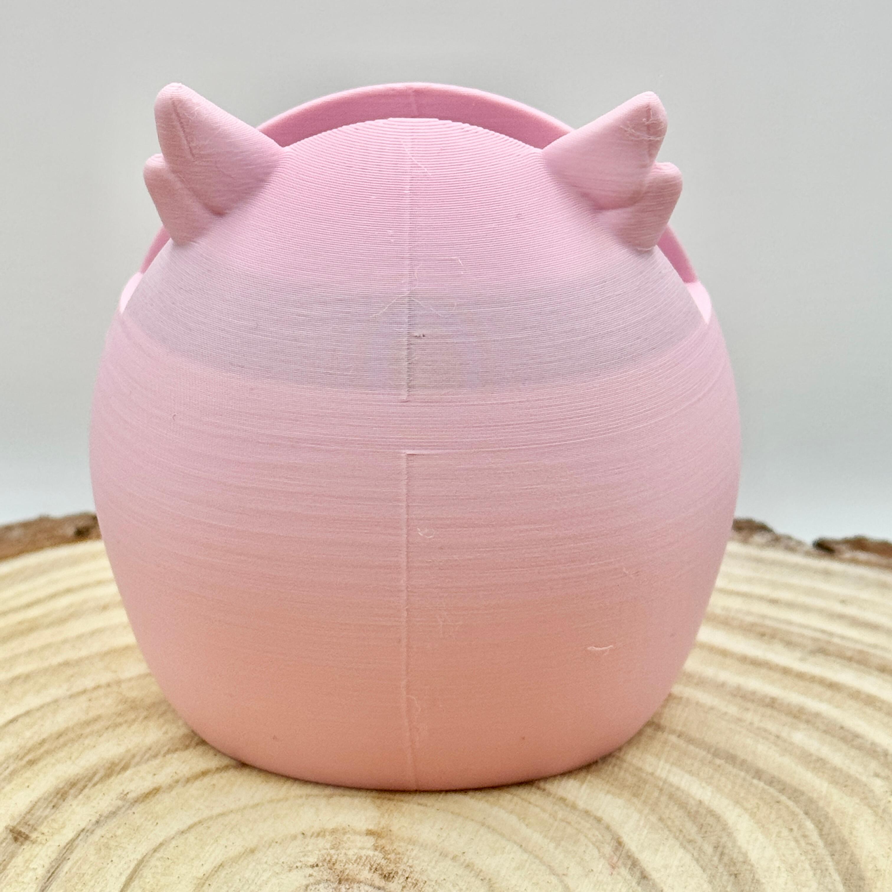 imperfection on pink owl shaped glasses stand