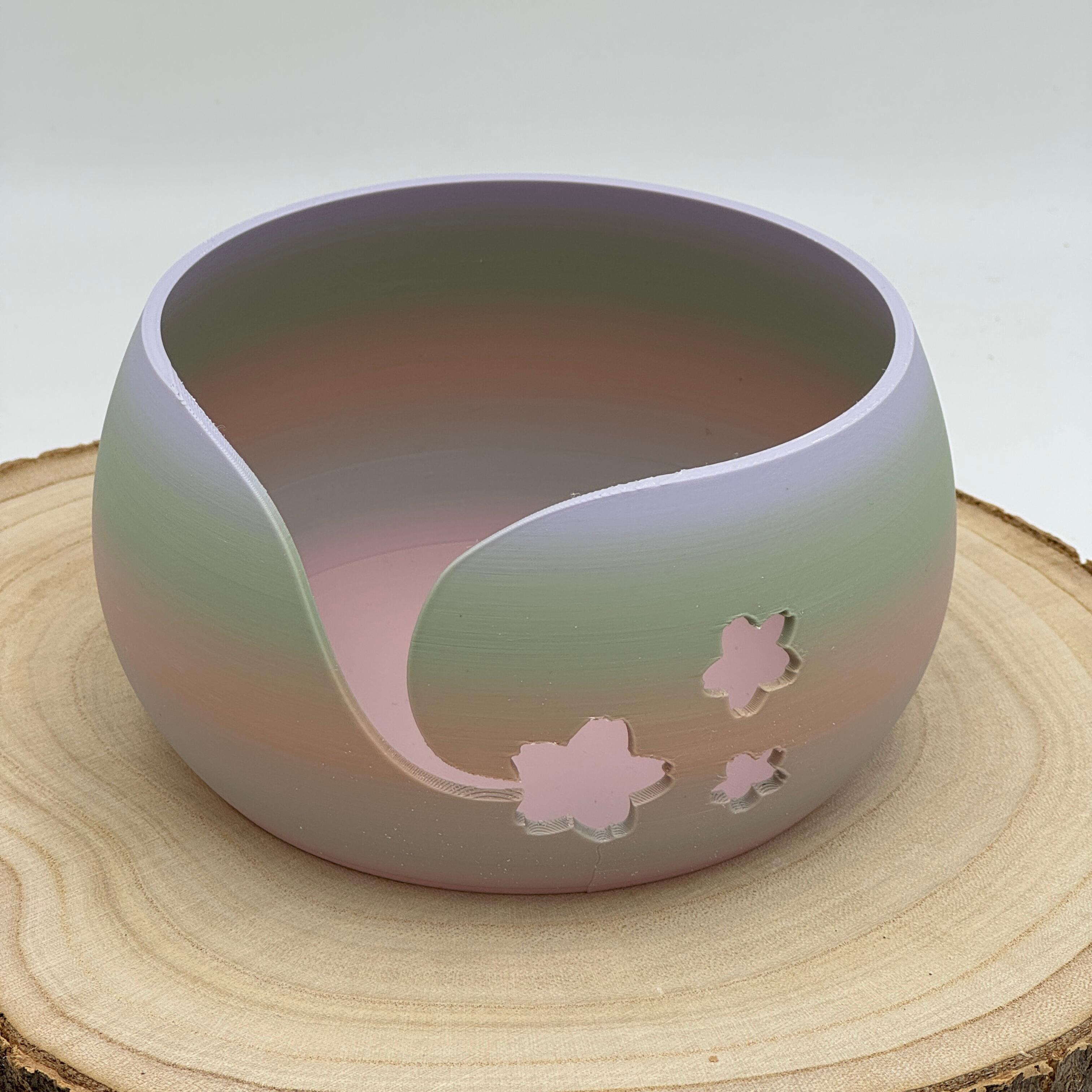 an image of a floral themed yarn bowl in grey, green & brown