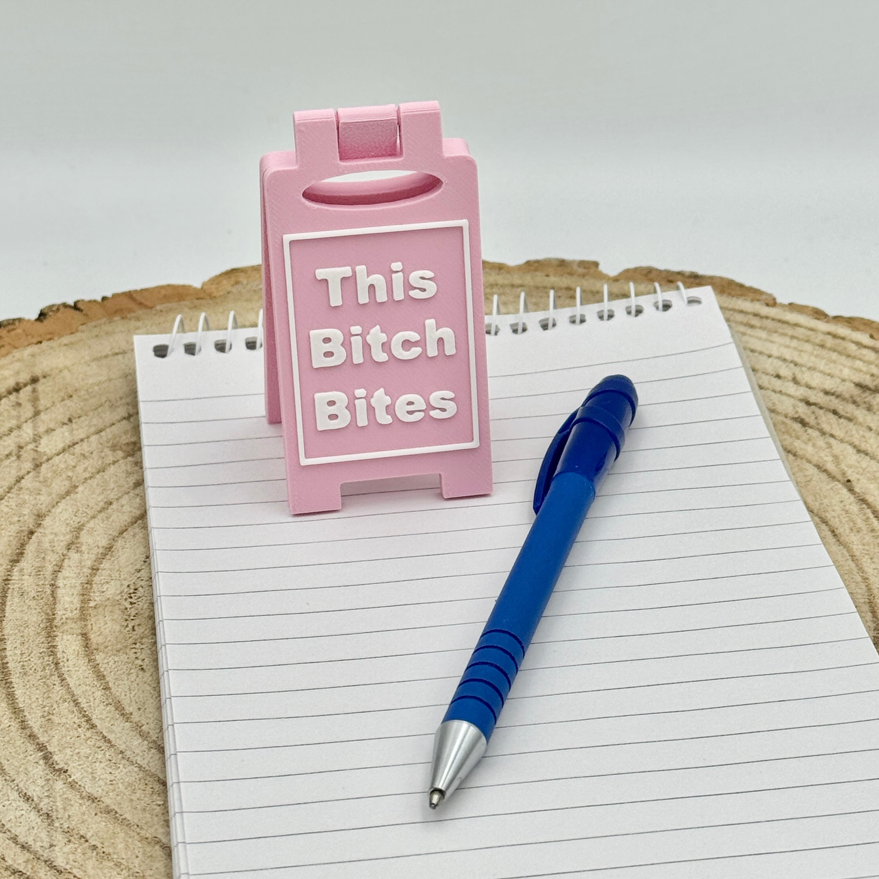 an image of a sweary or rude desk sign