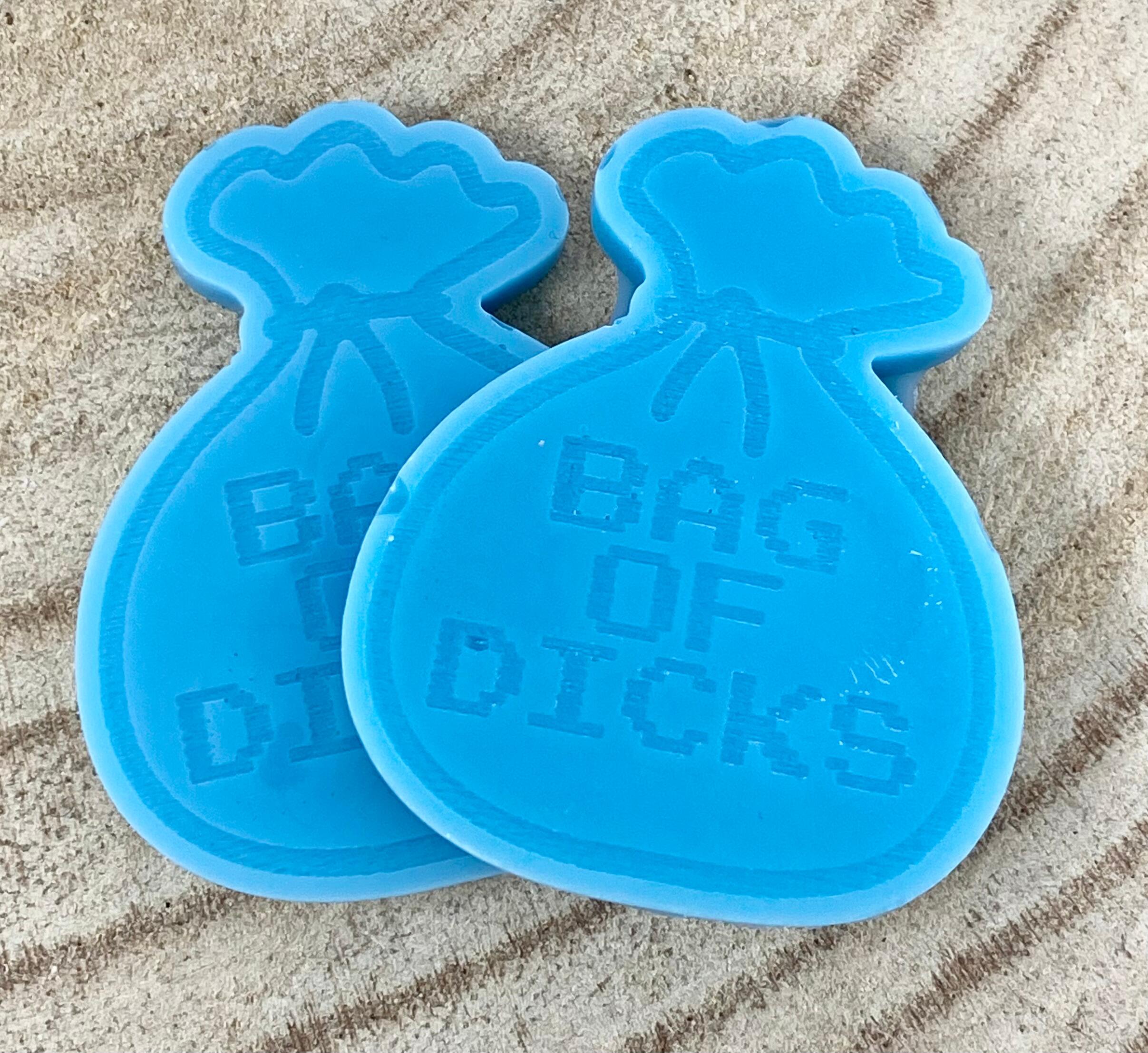 a close up of an image of a bag of dicks wax melts