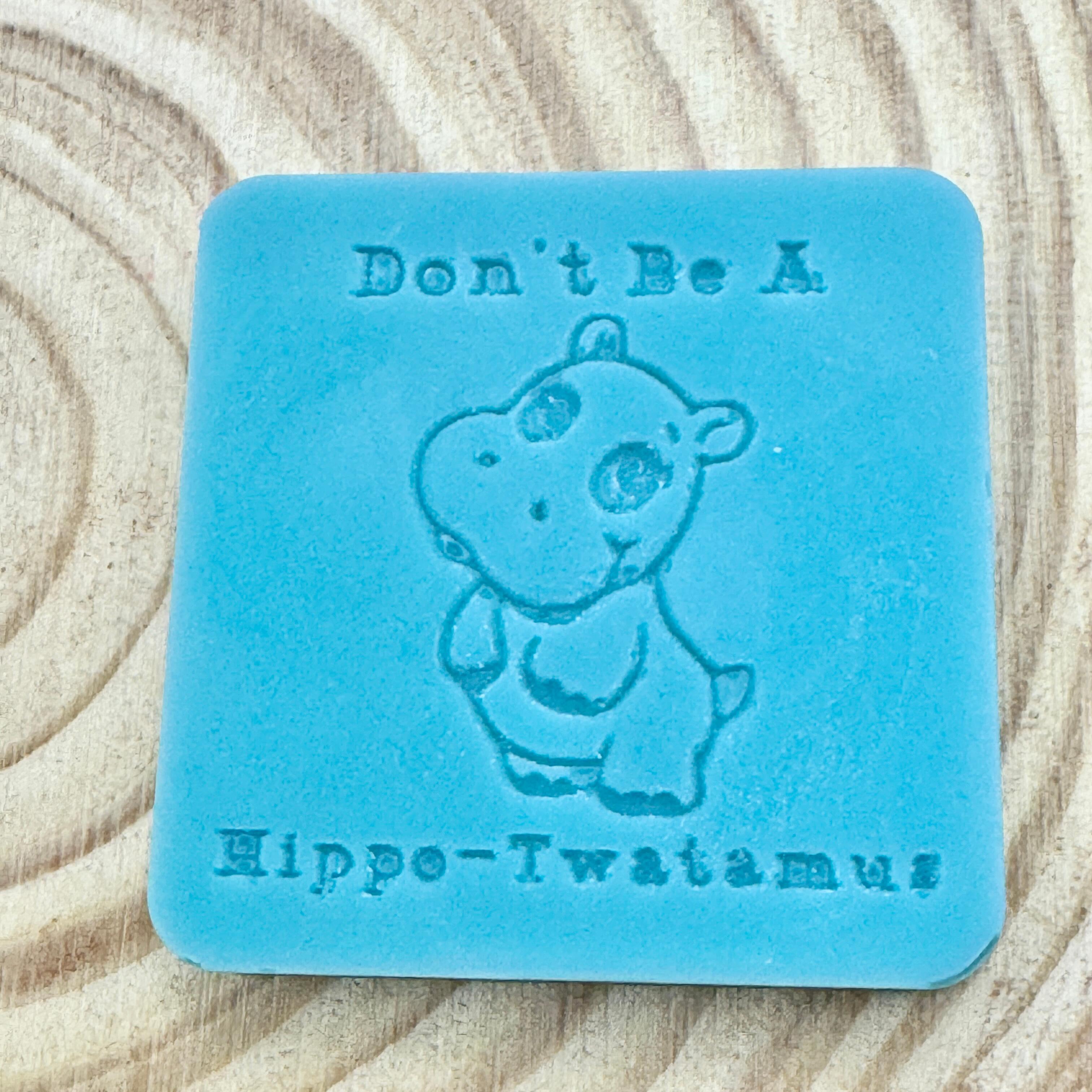 an image of a sweary wax melt square that reads hippotwatamus