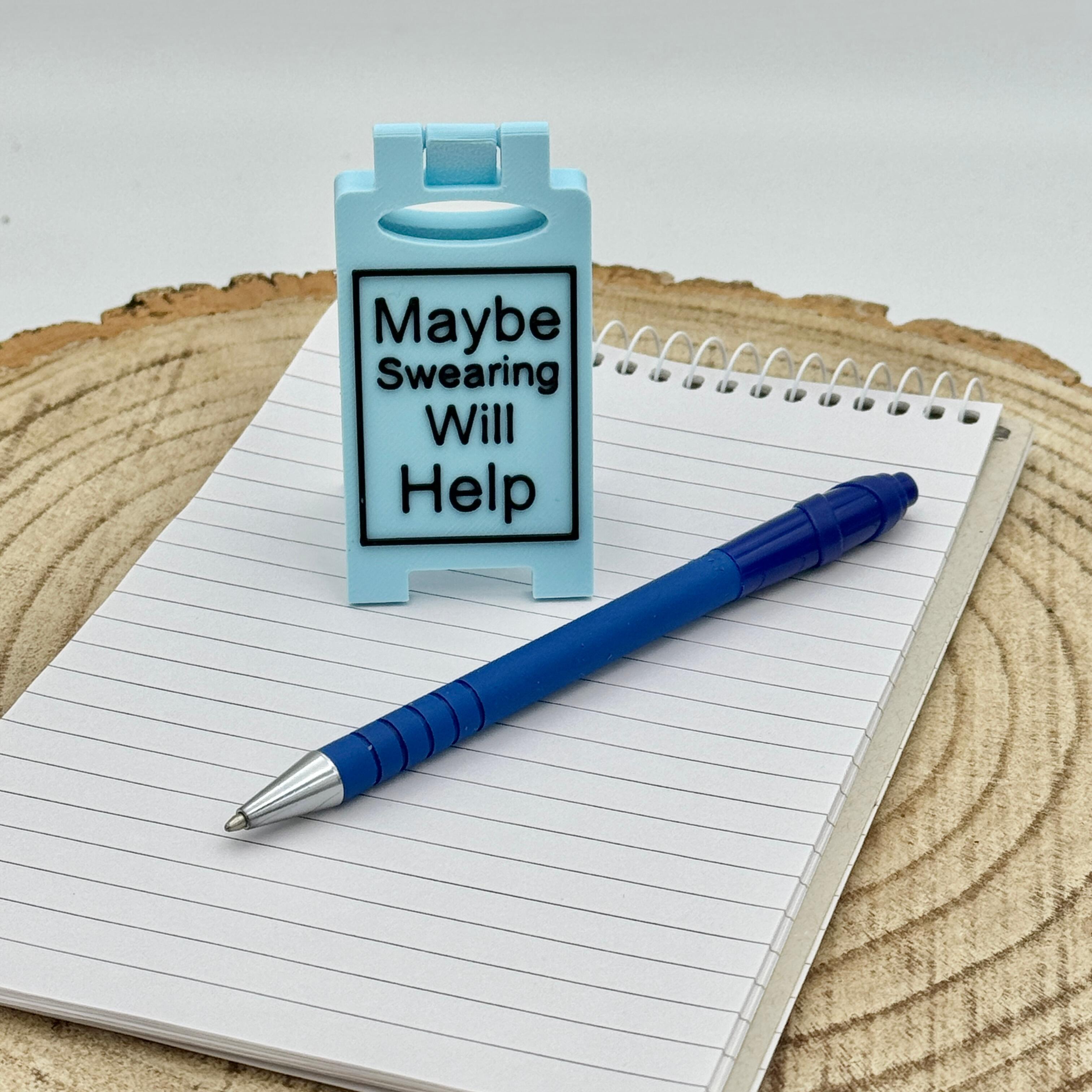 an image of a sweary or rude desk sign