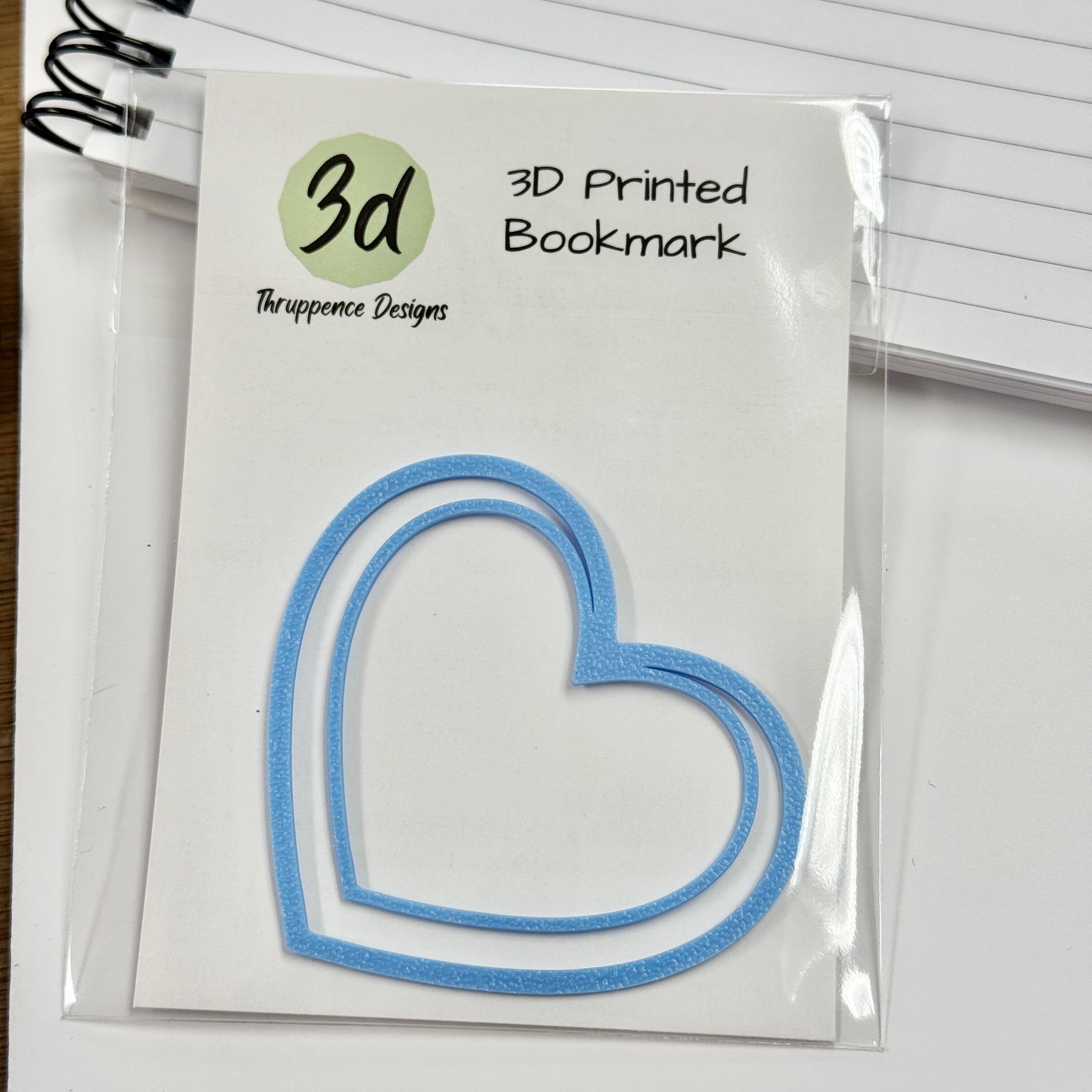 light blue heart shaped bookmark packaged