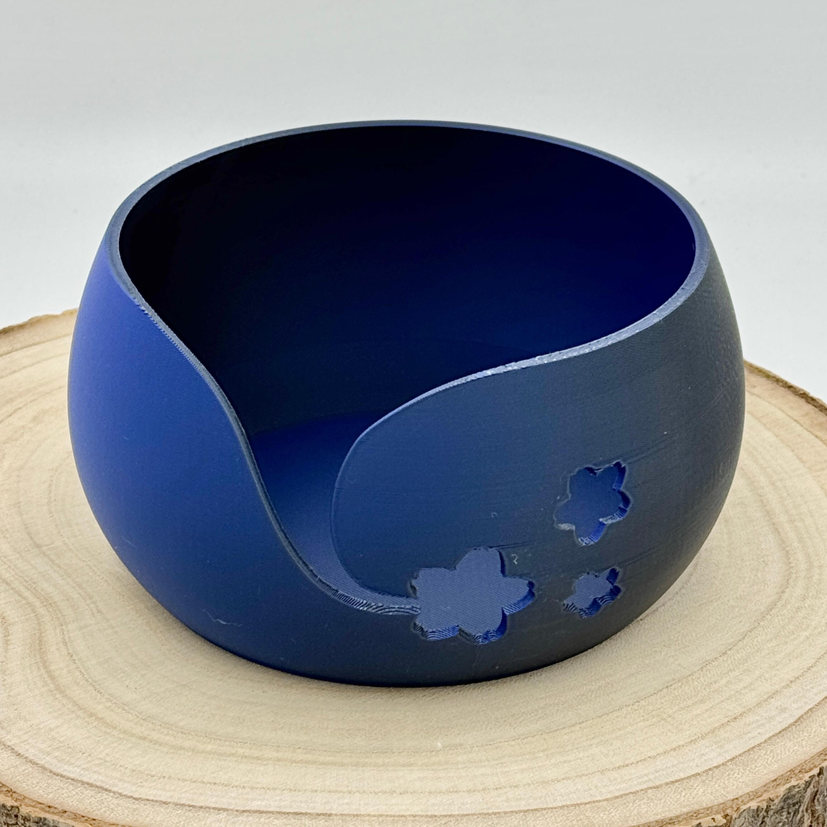 an image of a floral themed yarn bowl in blue & black