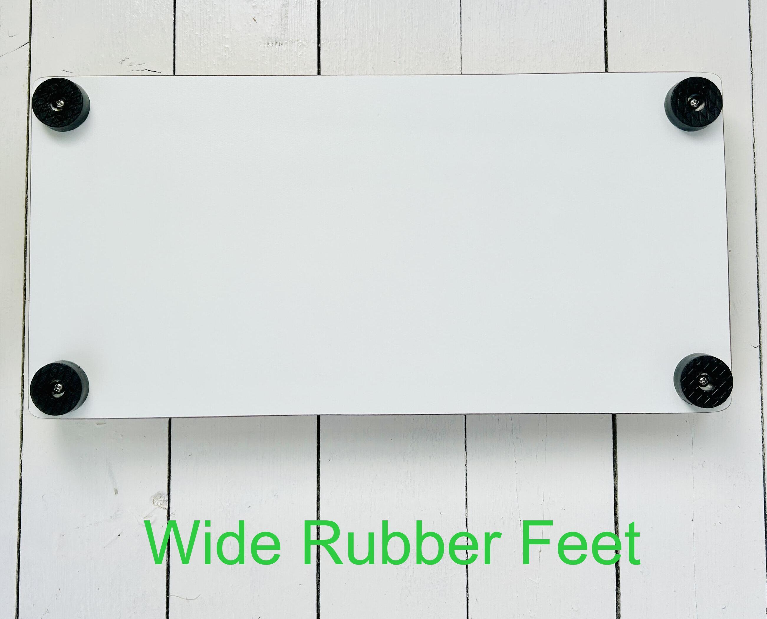 underside of solid wood pet feeding stand showing wide rubber support feet