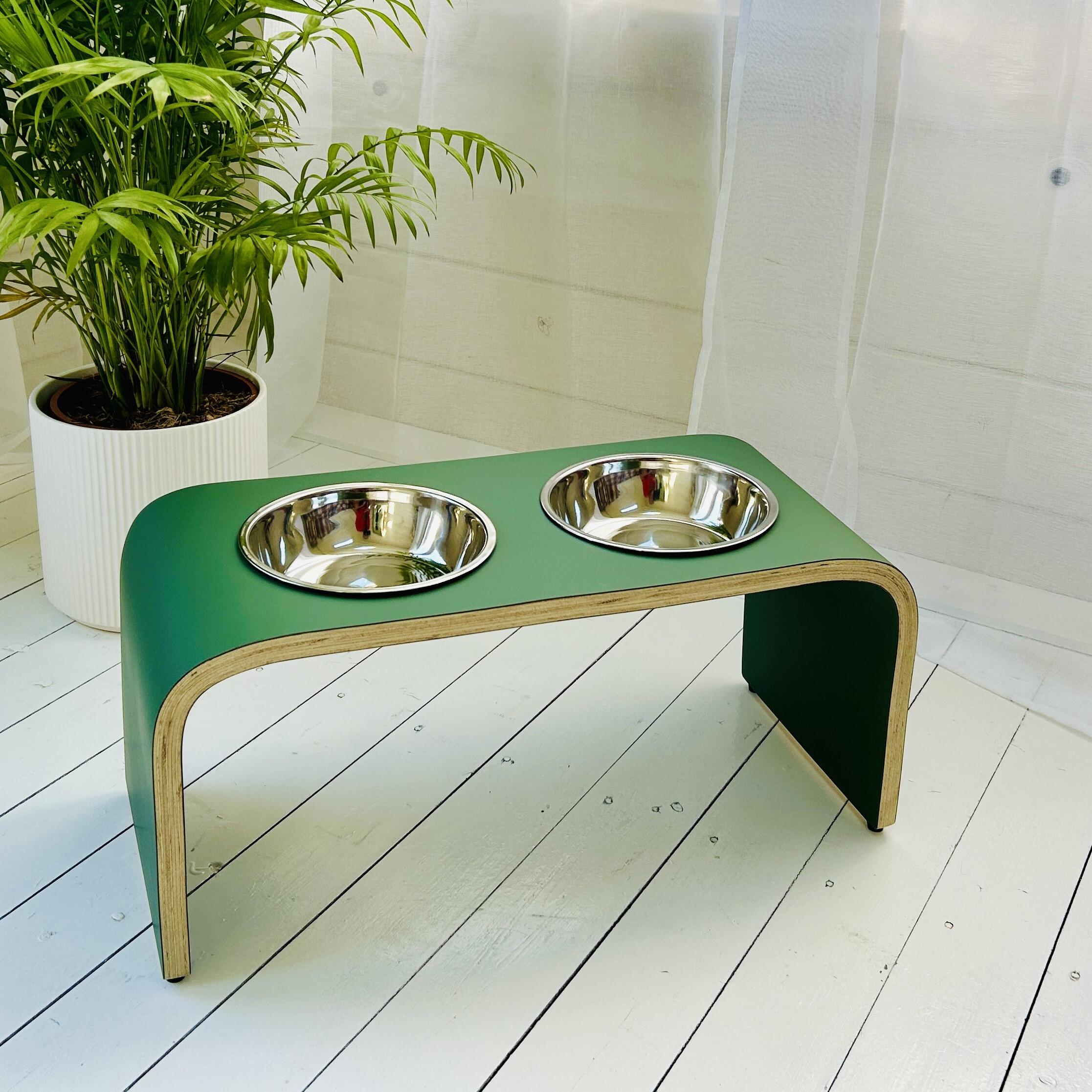 front view of dark green double bowl wooden dog feeder in dark green