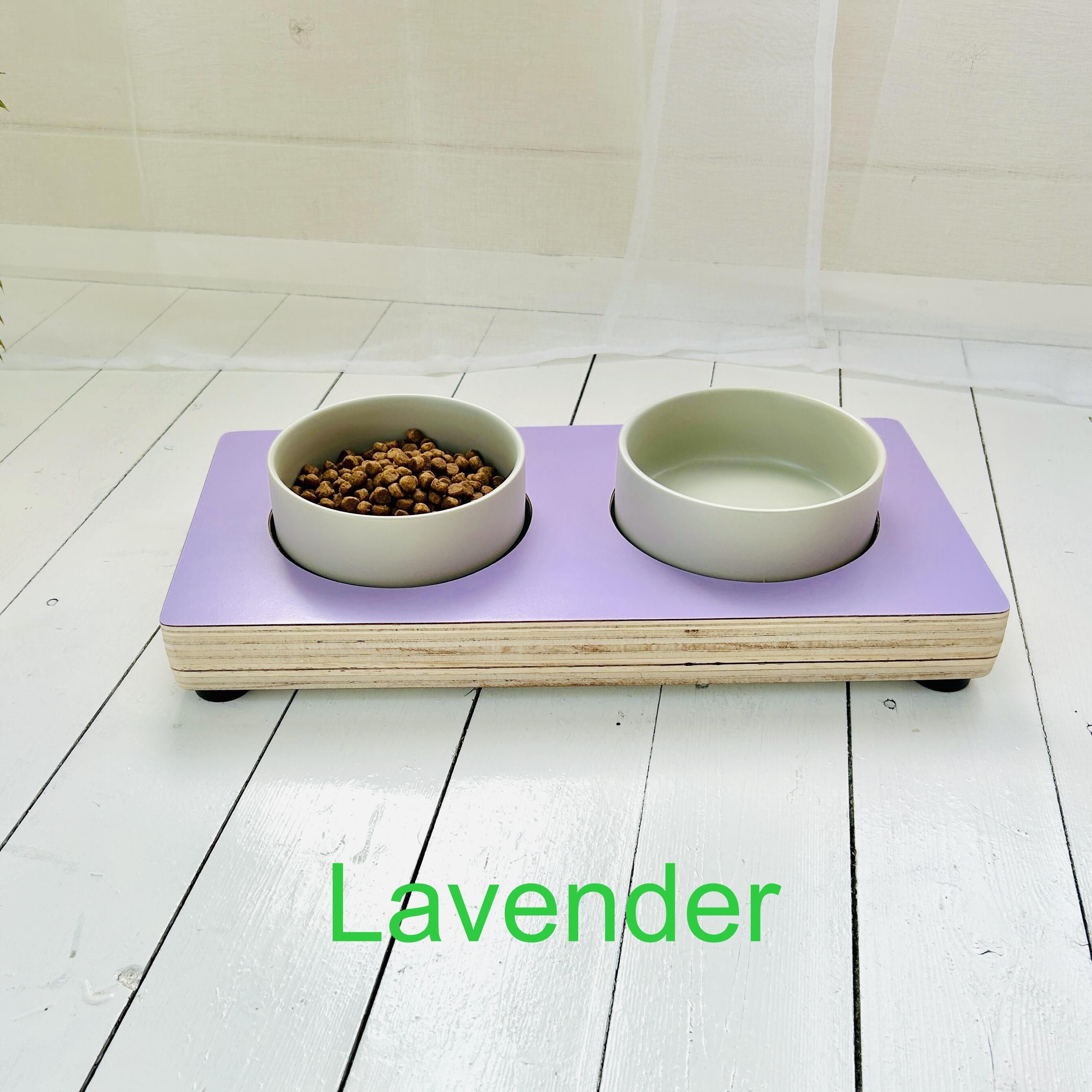 lavender purple wooden cat feeder with two ceramic bowls