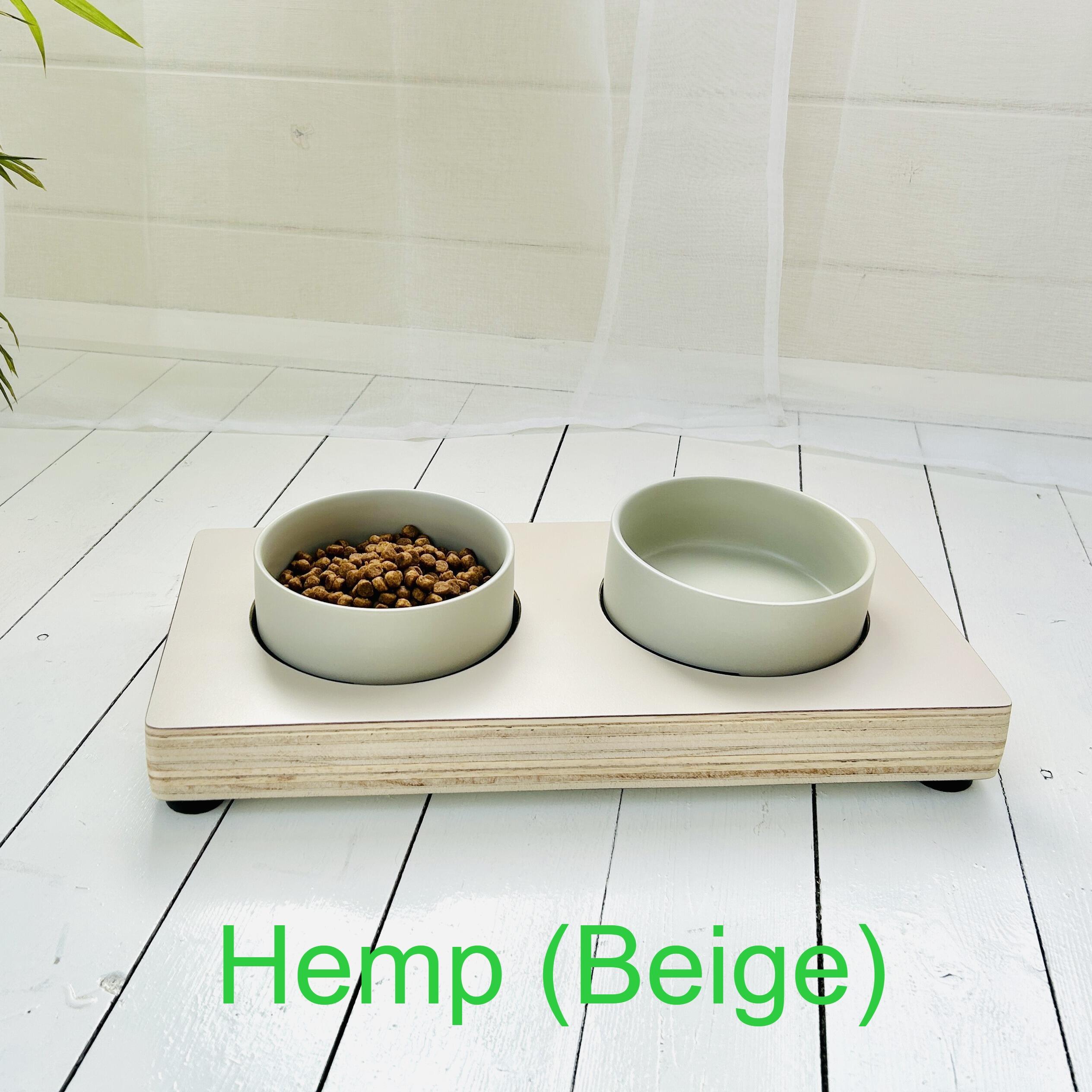 beige wooden low pet feeder with grey ceramic bowls