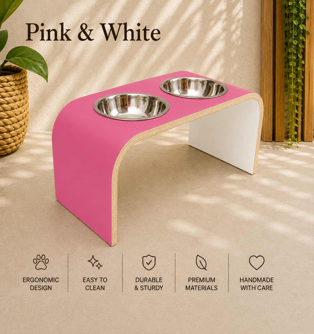 Pink and white raised dog bowl stand with stainless steel bowls, handmade elevated wooden pet feeder in a bright contemporary home, modern feeding station for dogs and cats.