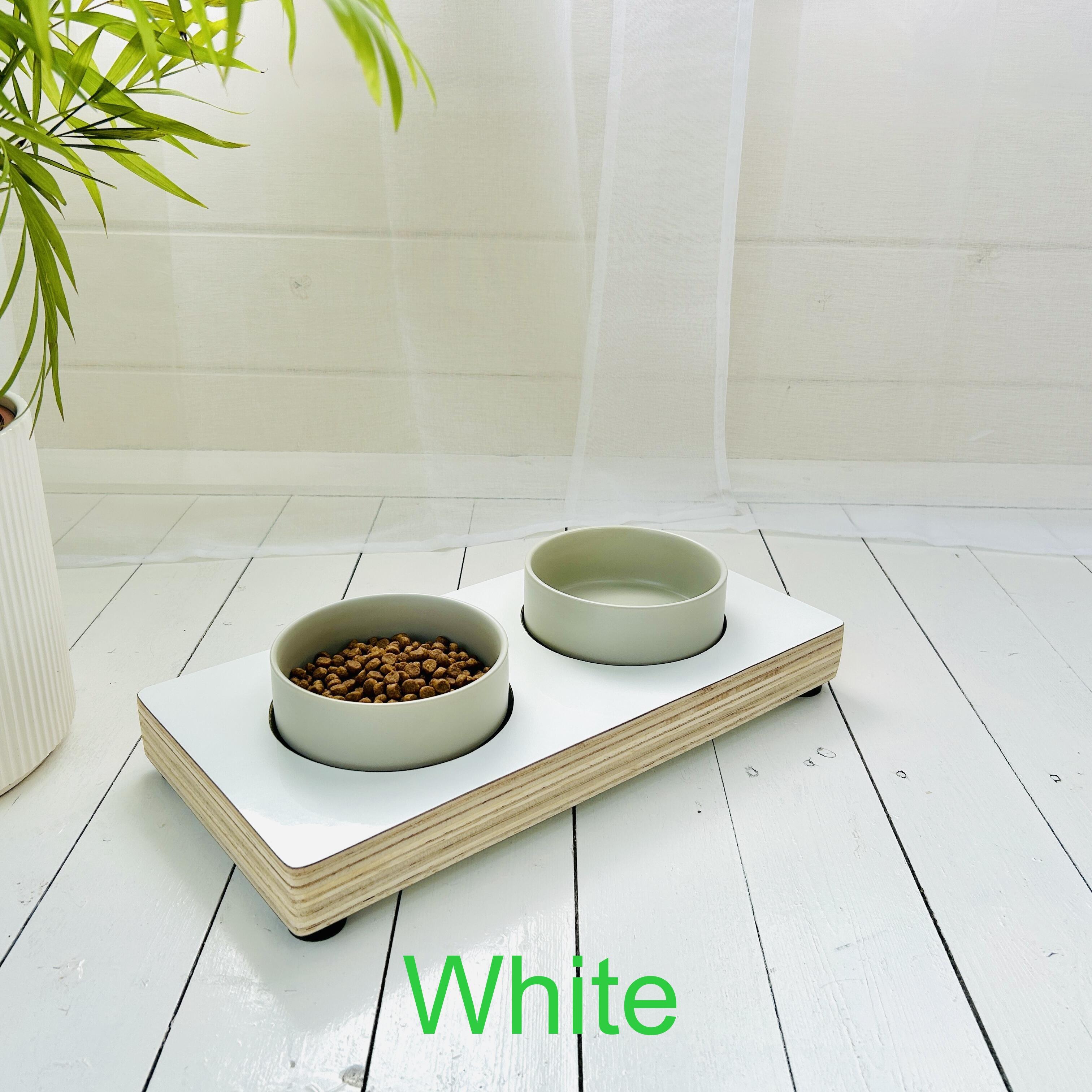 white gloss finished low feeding staion for small dogs and cats with ceramic bowls