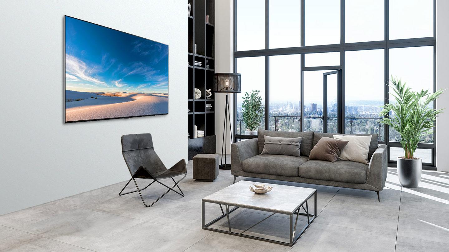 LG QNED TV sat in a room environment