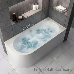 A j shaped whirlpool bath set in a moden bathroom