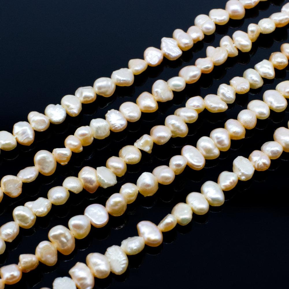 Freshwater Pearls 5mm Flat Oval Cream   14" String for jewellery making