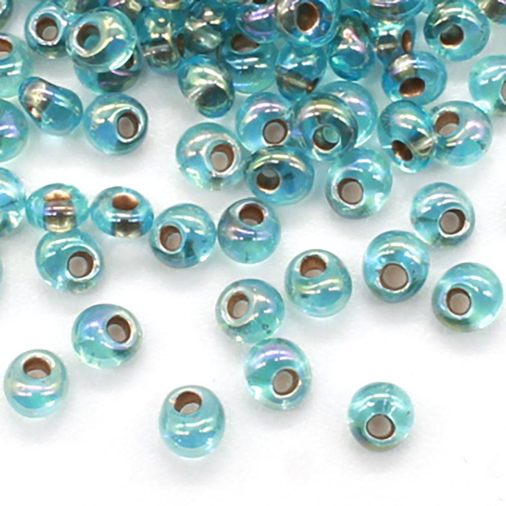 Toho Magatama Beads 3mm 10g - Gold Lined Rainbow Aqua