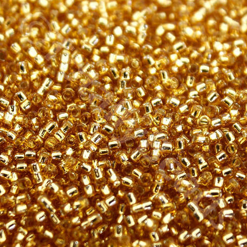Toho Size 15 Seed Beads 10g - Silver Lined Med Topaz