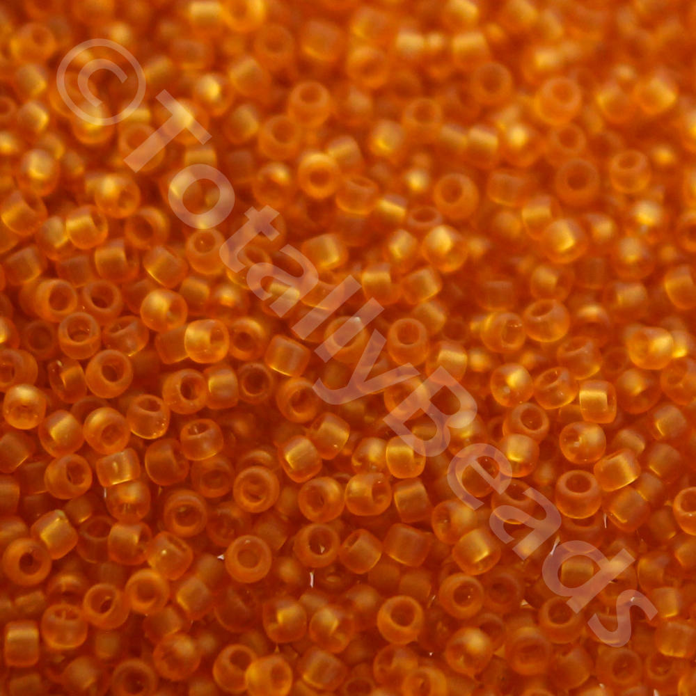 Toho Size 15 Seed Beads 10g - Trans Frosted Dk Topaz