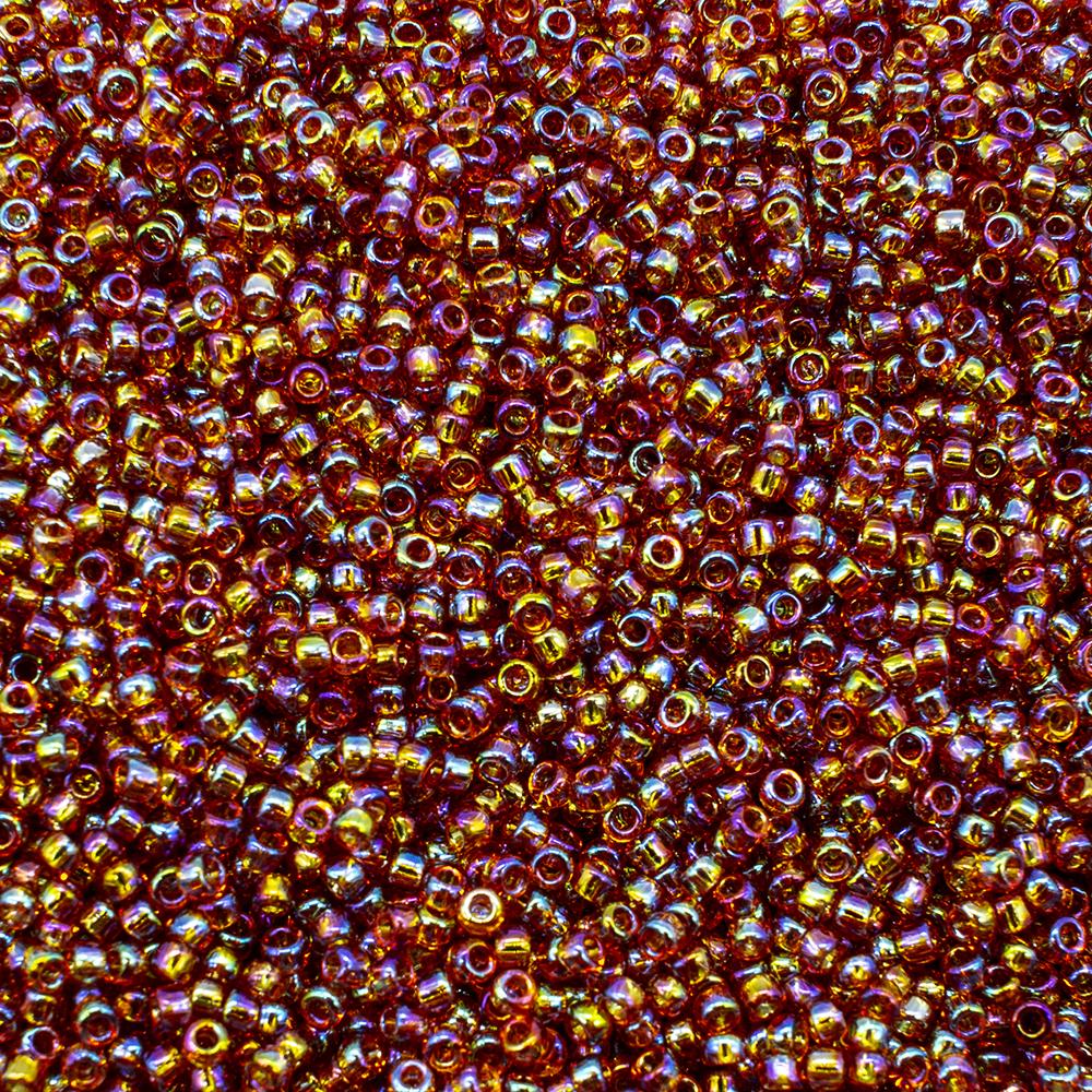 Toho Size 15 Seed Beads 10g - Trans Rainbow Metallic Topaz