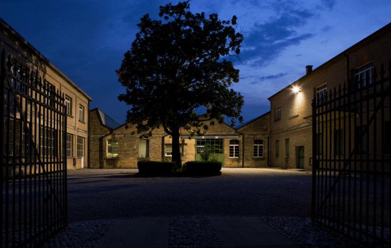 In the courtyard stands a magnolia tree that has been both witness and emblem of dynamic factory life